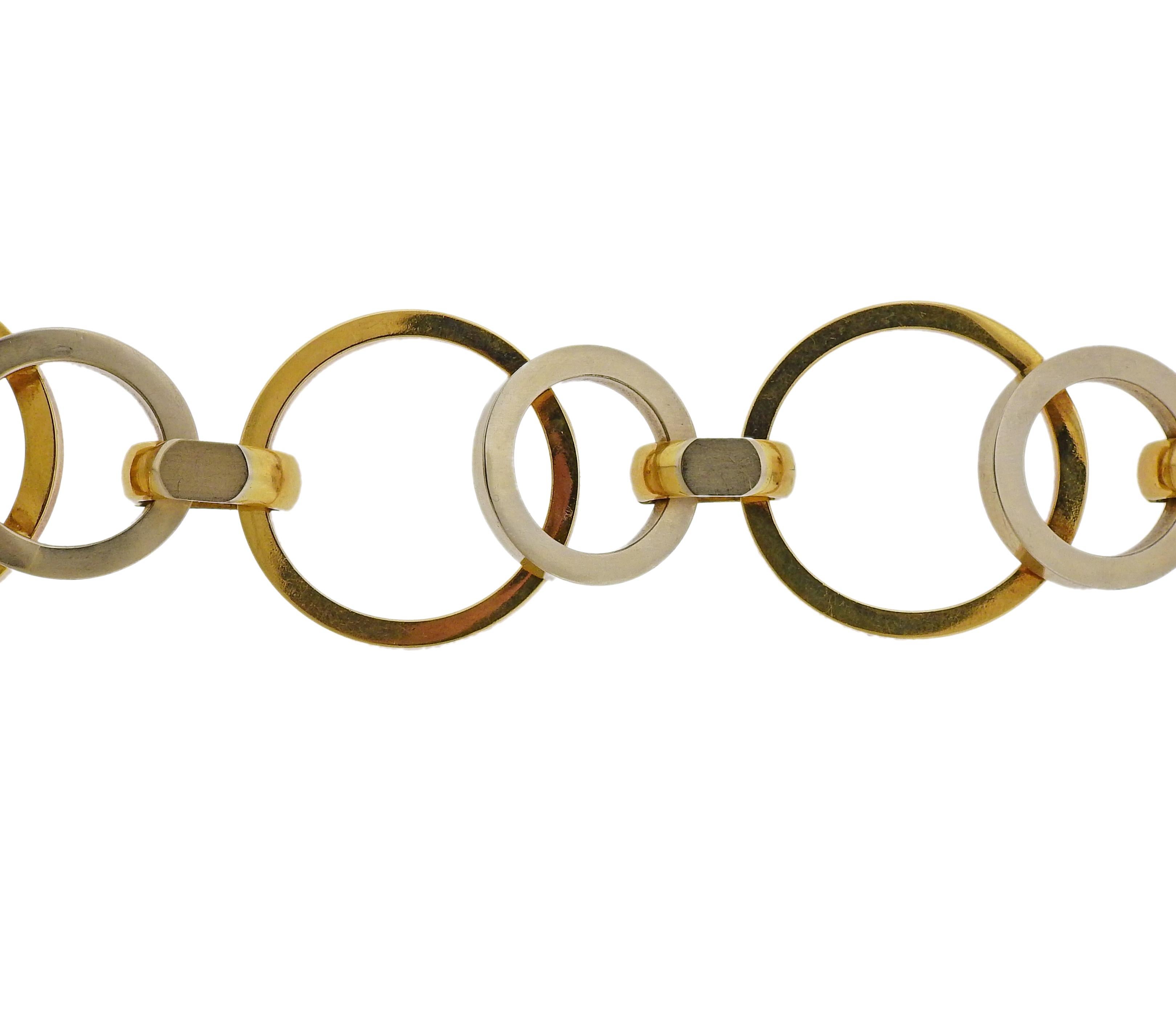 Italian 18k gold multi circle link bracelet by UnoAErre. Measuring 8