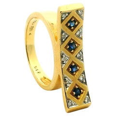 UnoAErre Italian 18K Gold Modernist Sapphire
Diamond Bar Ring, 1980