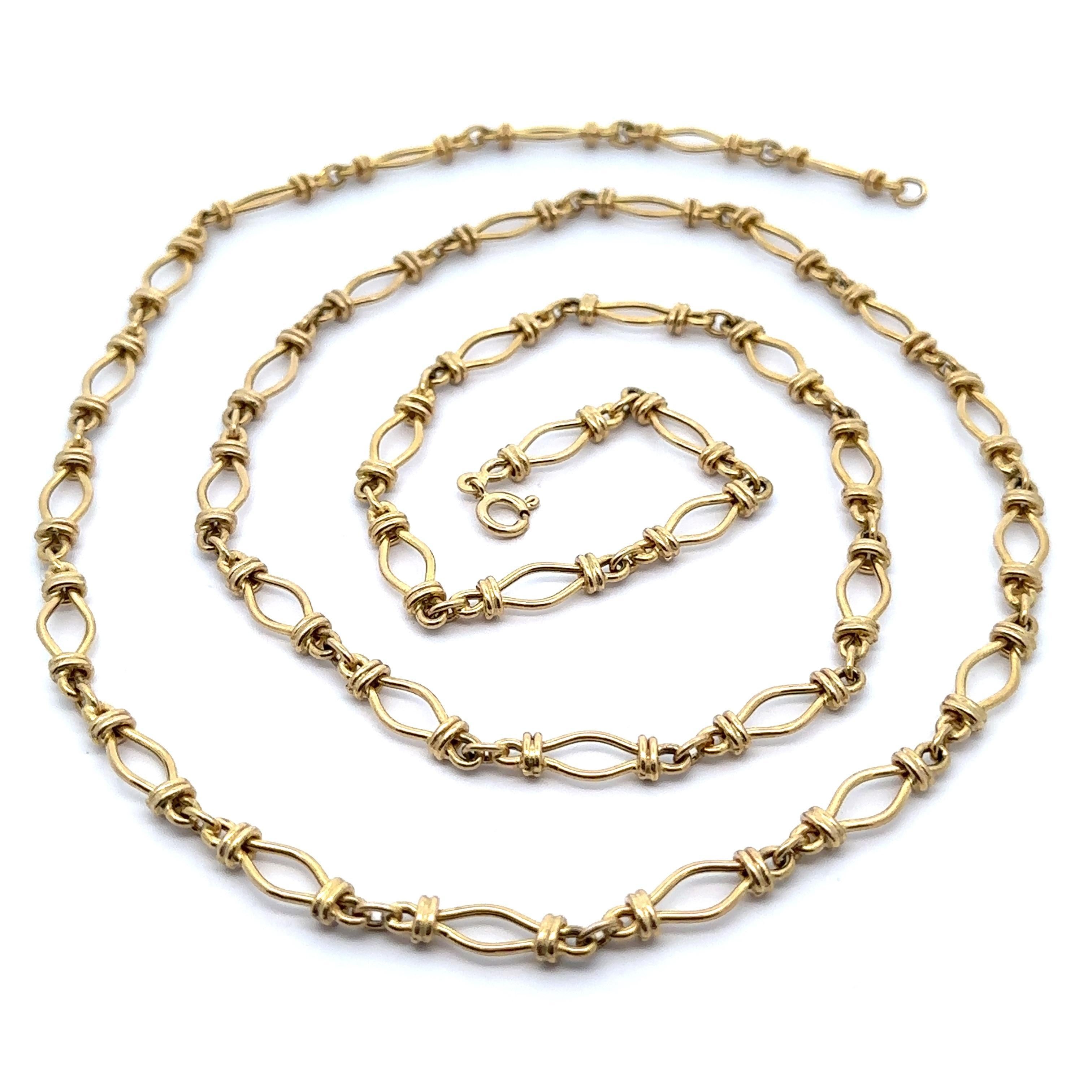 UnoAErre è una collana a catena aperta in oro giallo massiccio 14k lunga 36