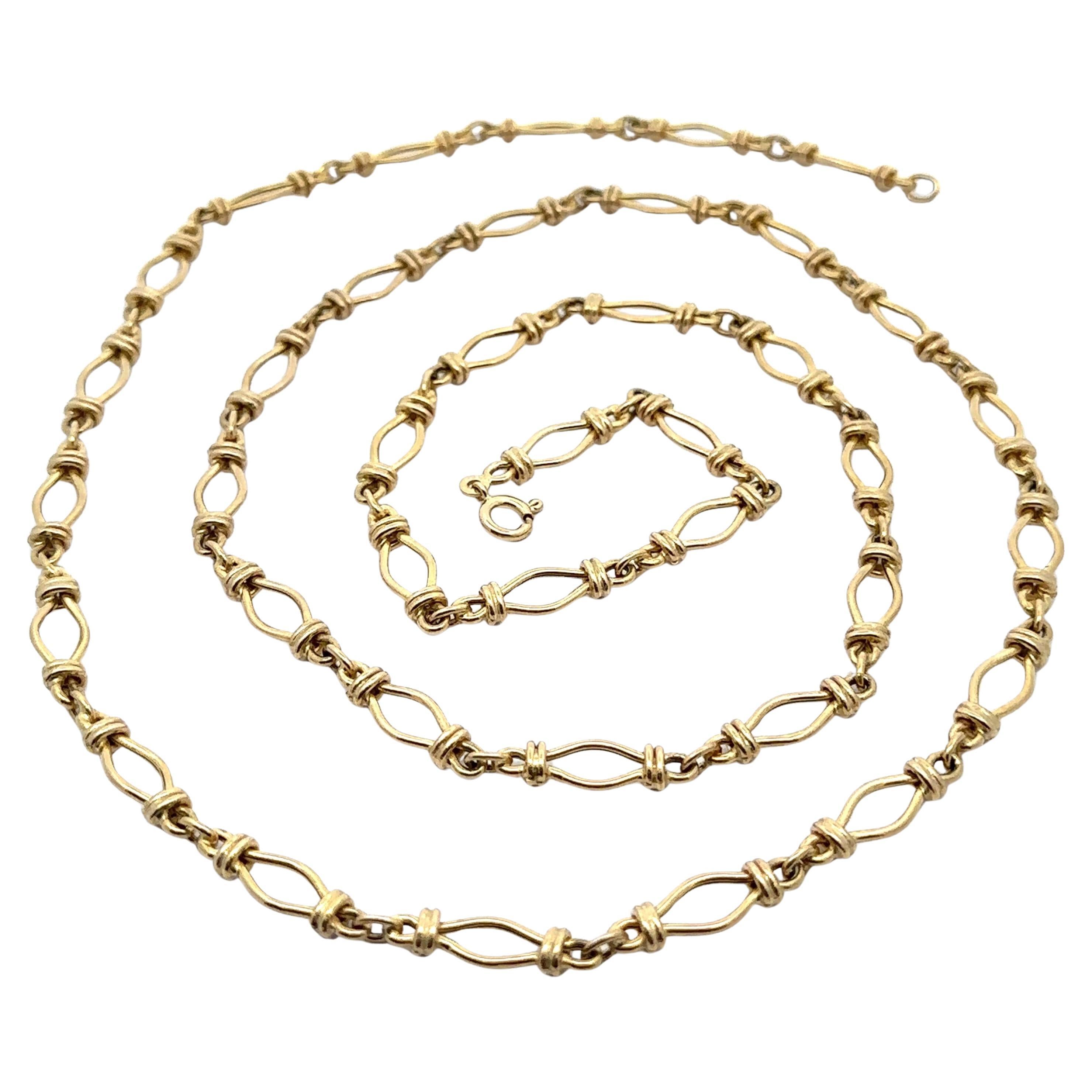 UnoAErre è una collana a catena aperta in oro giallo massiccio 14k lunga 36".