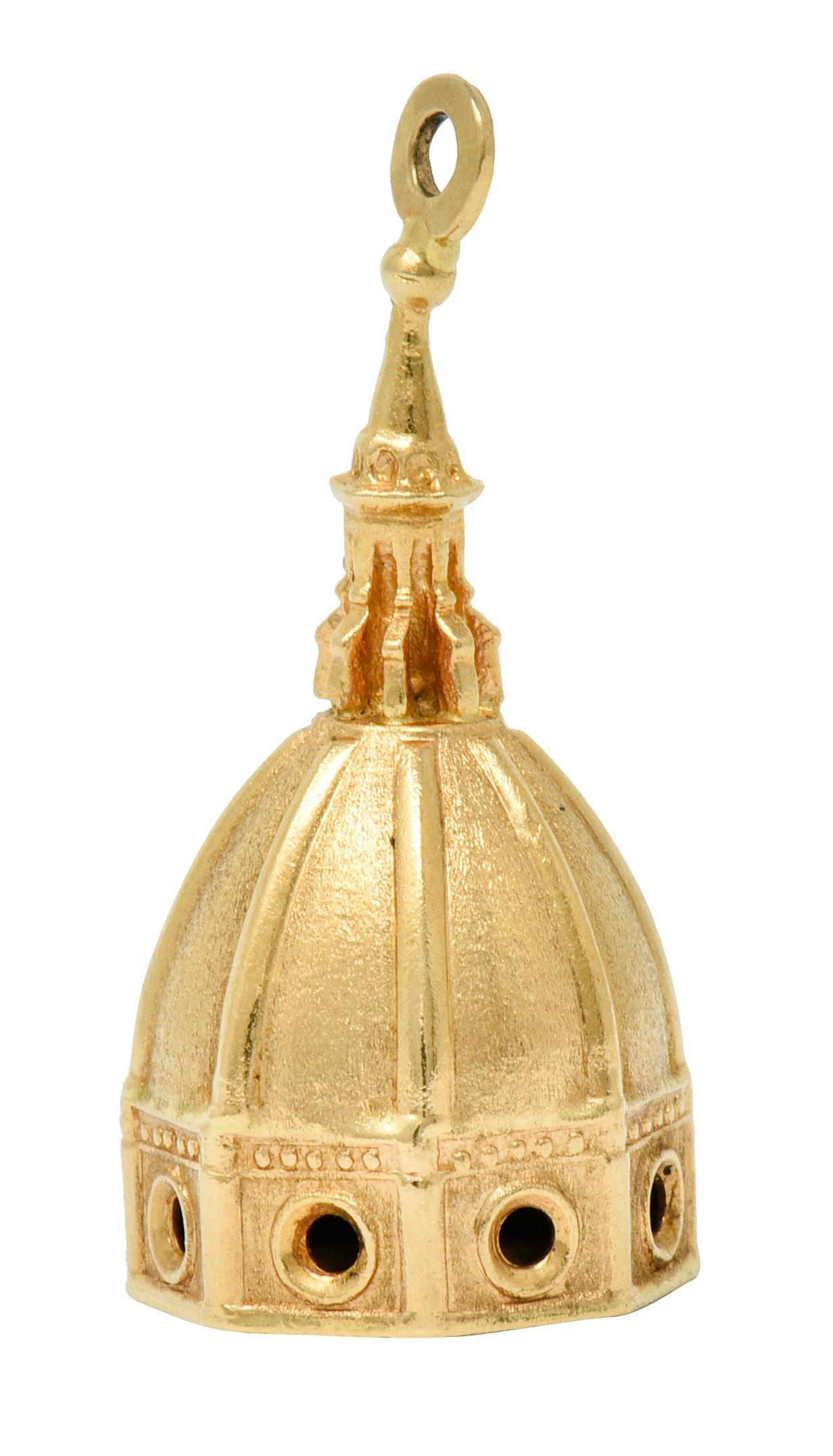 Charm is designed as the famed dome of Florence's Duomo Basilica

With an intricately rendered cupola and a pierced tambour

Completed by bale and a finely textured finish

With Italian assay marks for 18 karat gold

Signed UnoAerre

Circa: