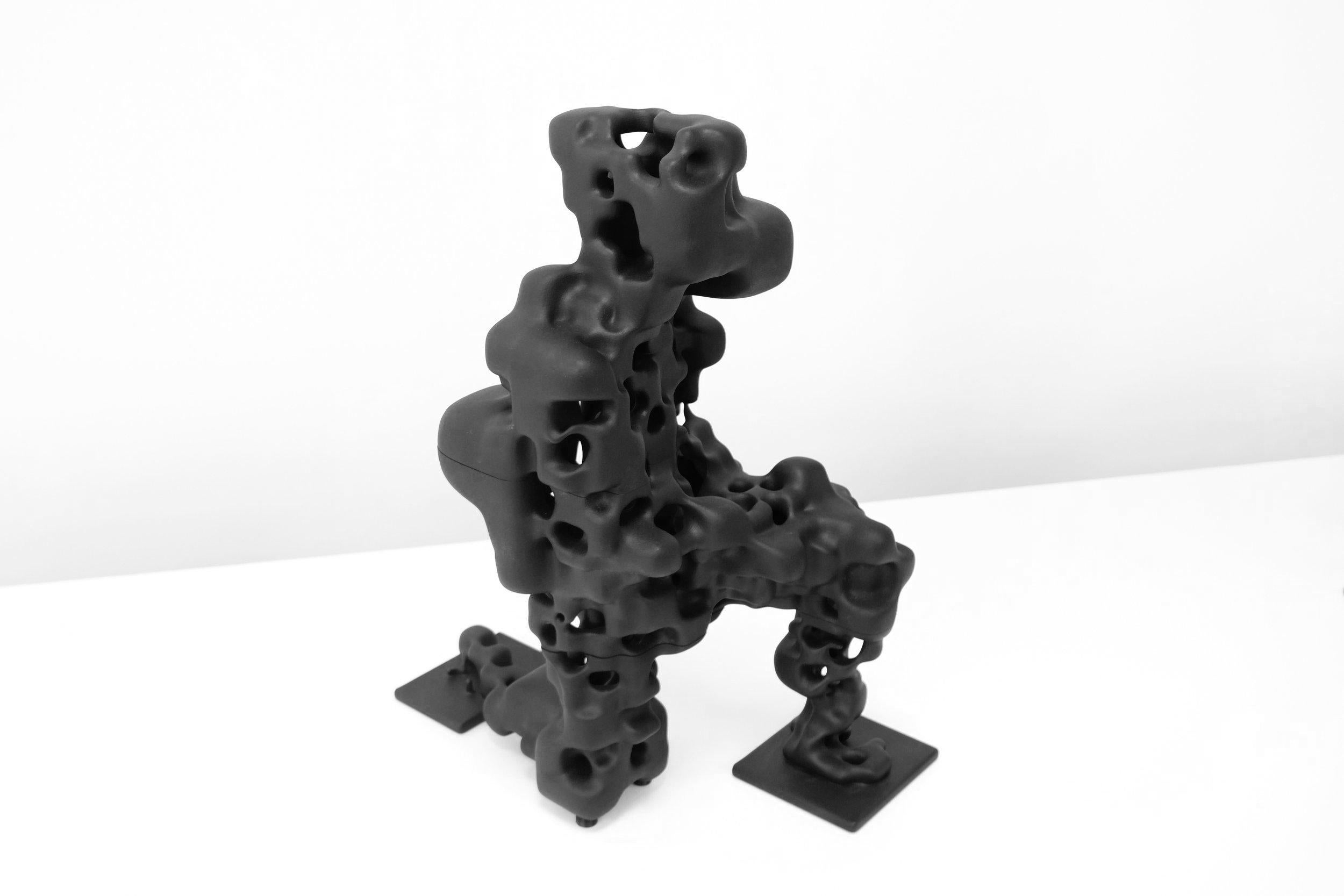 This humanoid sculpture was first created digitally by 3D canning a kneeling human subject through photogrammetry and then passing the scan through generative algorithms, after which it was fabricated with recycled Nylon PA 12 and MJF, or Multi-Jet