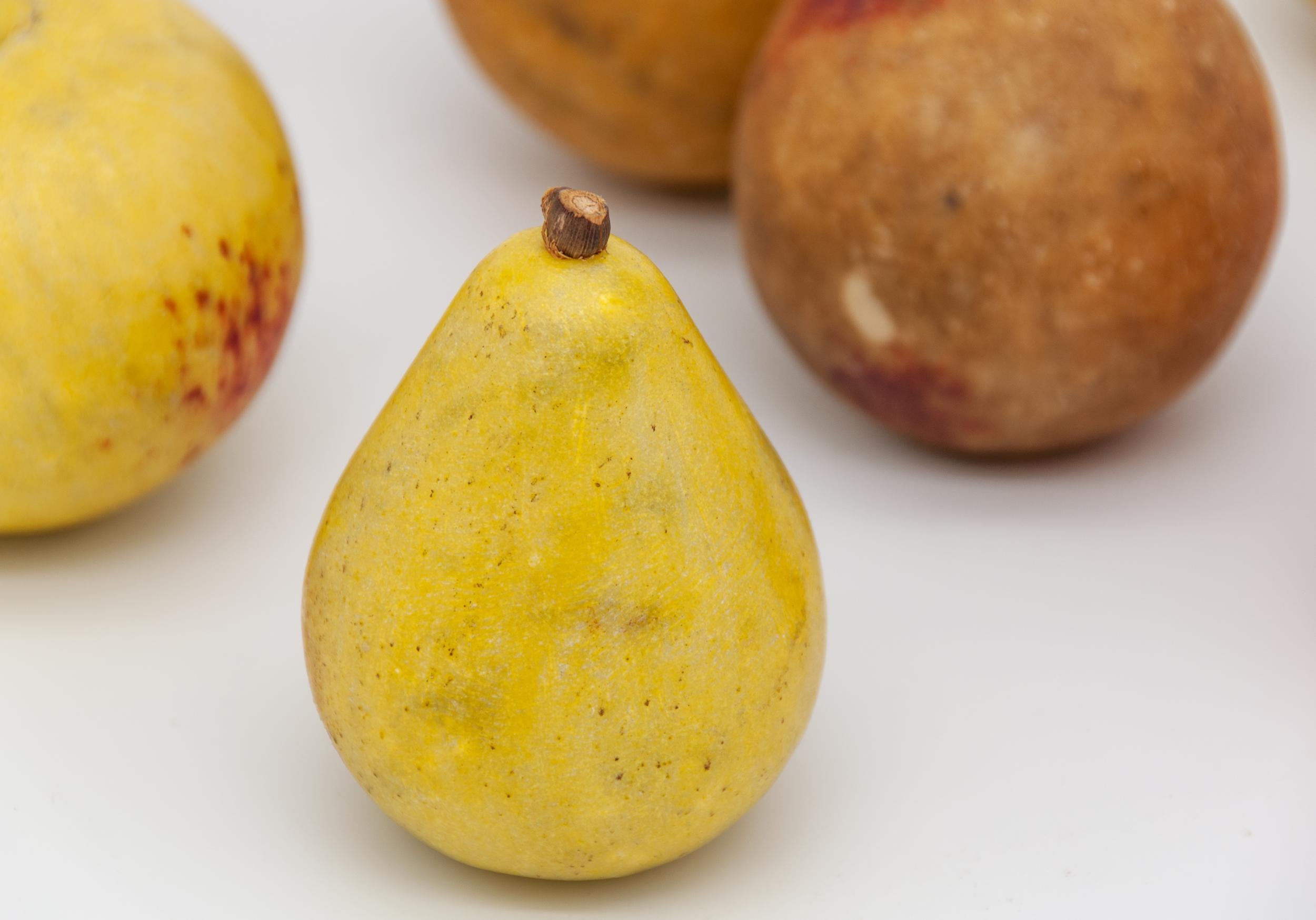 Set of 8 Italian stone fruits. Stone fruit was first made in the Victorian days, and became very popular after WWII. Made in Italy between 60 and 100 years ago, from white Carrara marble. The Italians made fruits, miniature fruits, oversize fruits,