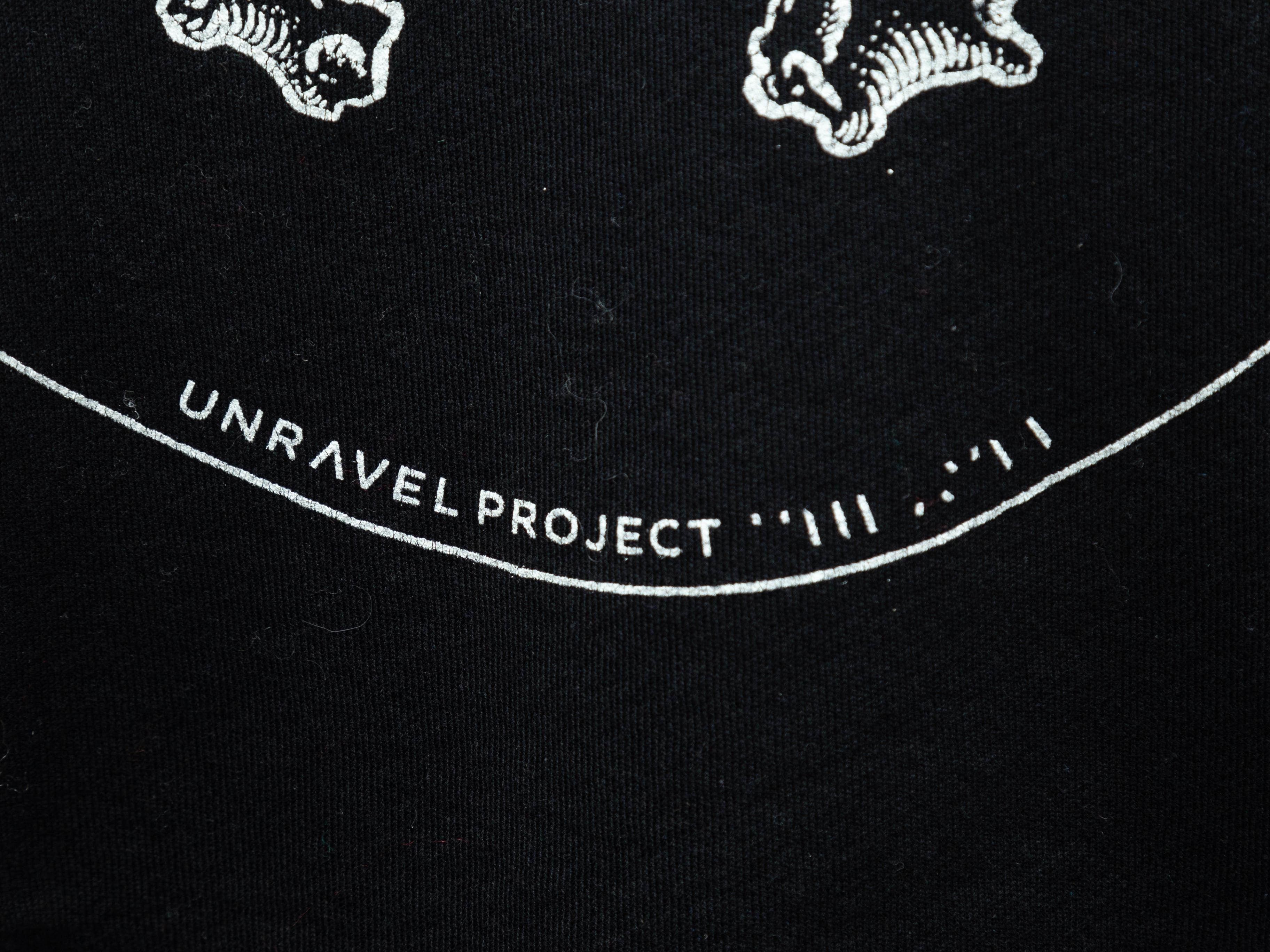 Product details: Black and white distressed sweatshirt by Unravel Project. Crew neck. Logo graphic print at front. 31