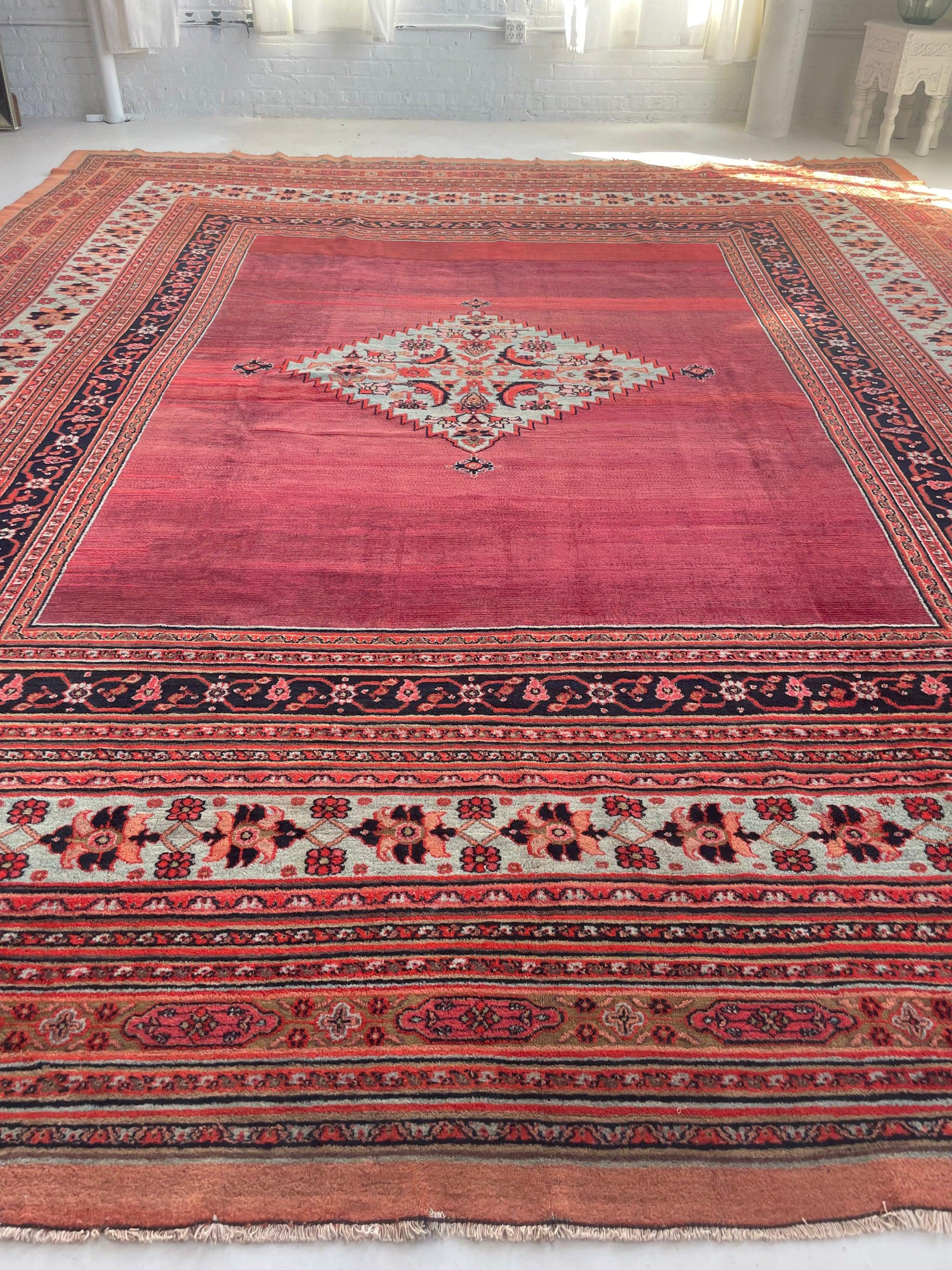Unreal Palatial Antique Carpet  Northeast Khorrassan Gem with Smokey Wine, Antique Ruby, Soft-Glacier Blue, Apricot

About: This is one of the most BEAUTIFUL pieces we've ever laid eyes on! That size with the open space of sangria-ruby meets smokey