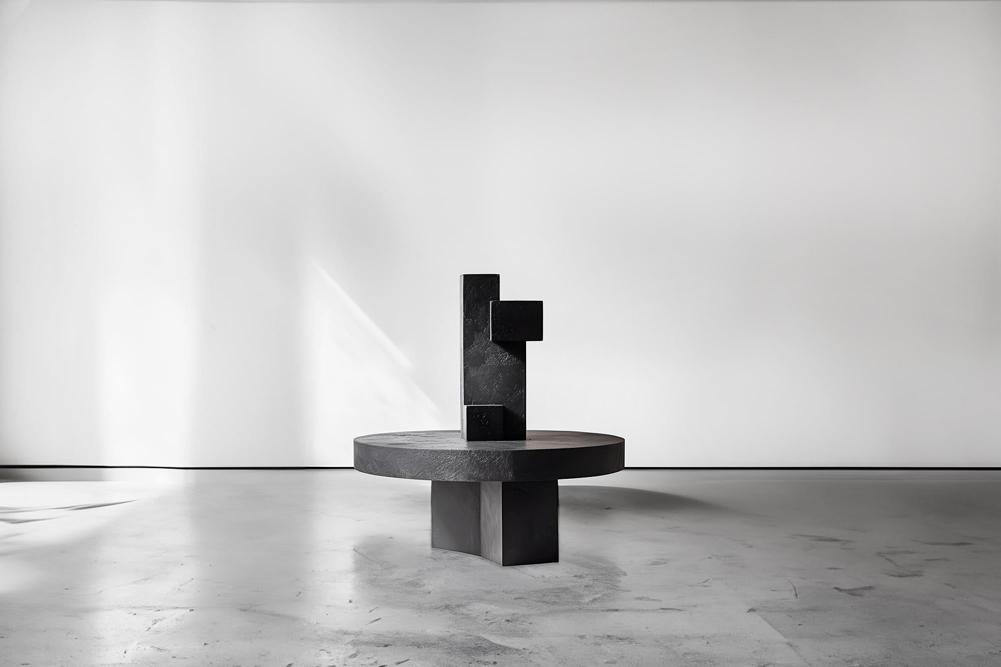 Unseen Force #1 Joel Escalona: Tisch aus massiver Eiche, Art-inspiriertes Design
--
Skulpturaler Couchtisch aus Massivholz mit natürlichem Finish auf Wasserbasis oder karbonisiert. Aufgrund der Natur des Produktionsprozesses kann jedes Stück in
