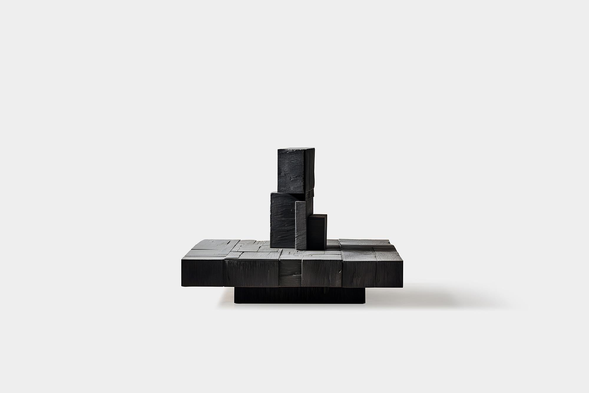 Force invisible n°55 : table de Joel Escalona, bois massif inspiré de la sculpture

Table basse sculpturale en bois massif avec une finition naturelle à base d'eau ou carbonisée. En raison de la nature du processus de production, chaque pièce peut