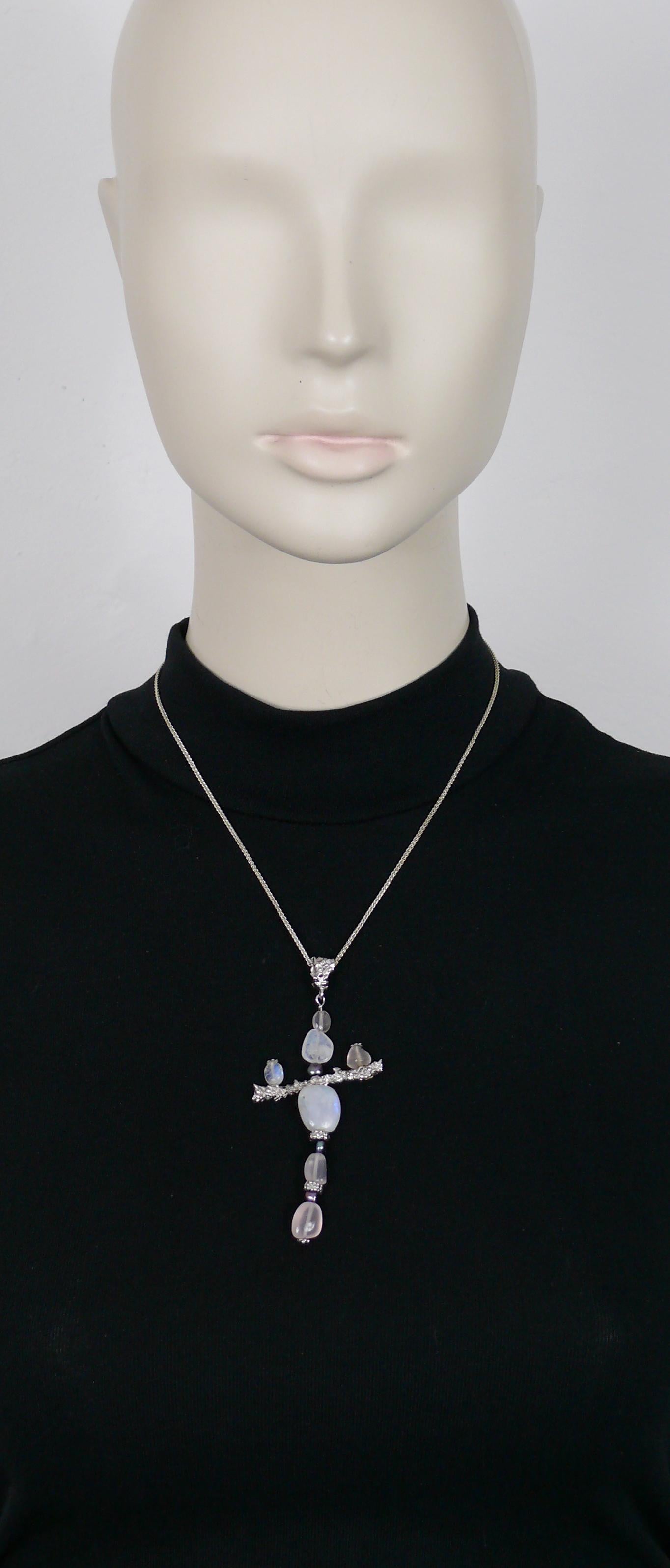 Unsigned CHRISTIAN LACROIX vintage sterling silver cross pendant necklace featuring semi precisous stones.

Sterling silver hallmarks 925 on the chain and bail.
UNSIGNED (but very well known pendant necklace model).

Indicative measurements : chain