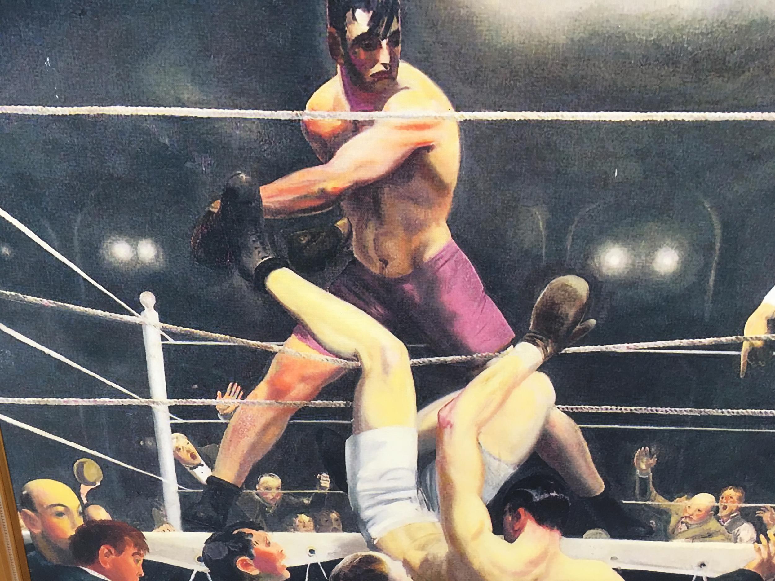 Unsigned boxing Glicee print featuring a prizefighter in the moment of knocking out his opponent. The painting is framed in a gold-tone frame.