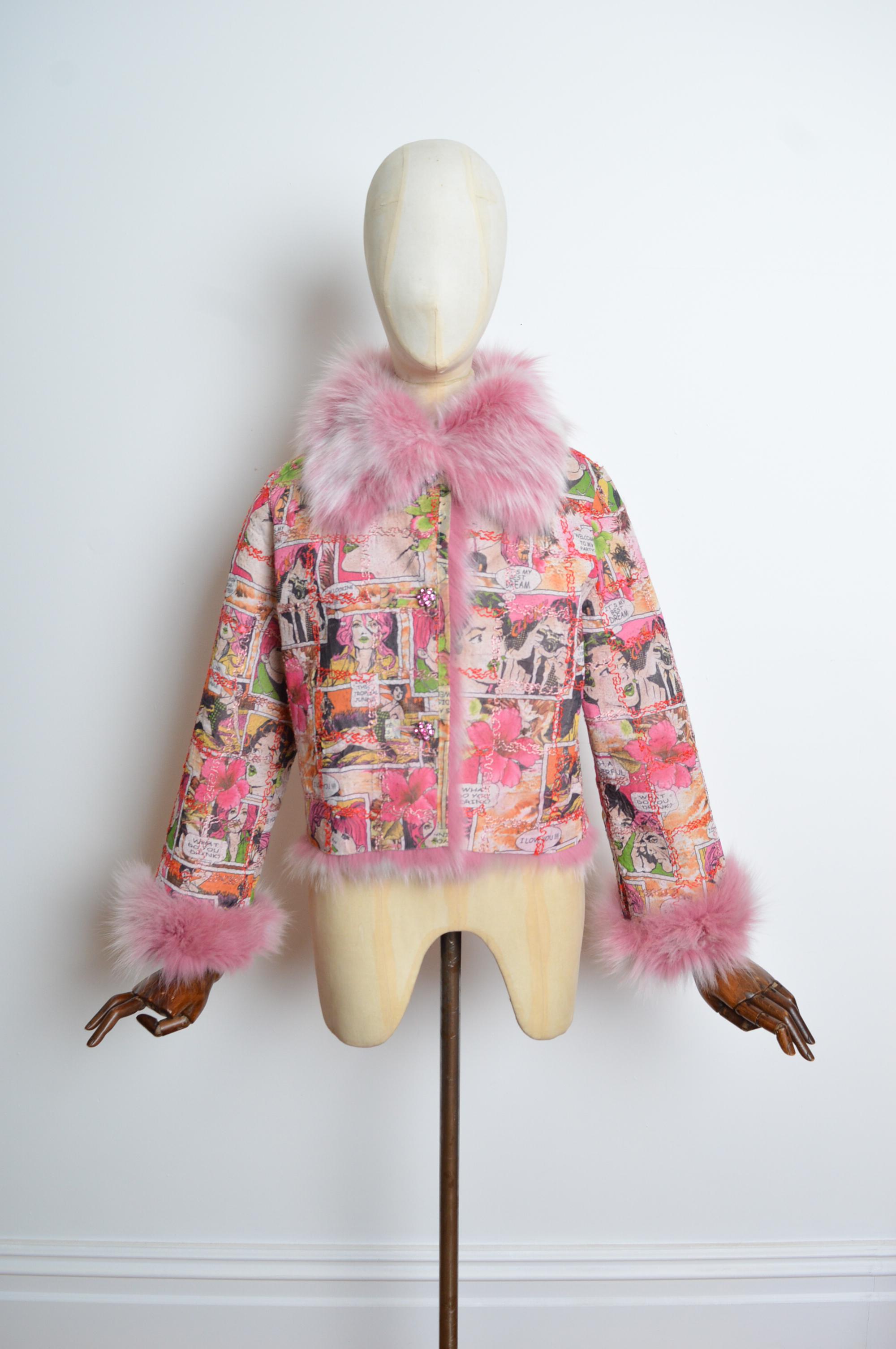 A delightful Vintage Fox Fur coat (Circa 2000) that can be reversed to a playful, colourful cartoon print jacket with fun, pink jewelled rhinestone buttons. 
Recommended Size; UK 6 - 10.
Measurements are provided in inches (‘’)
Pit to Pit; 20’’
Pit
