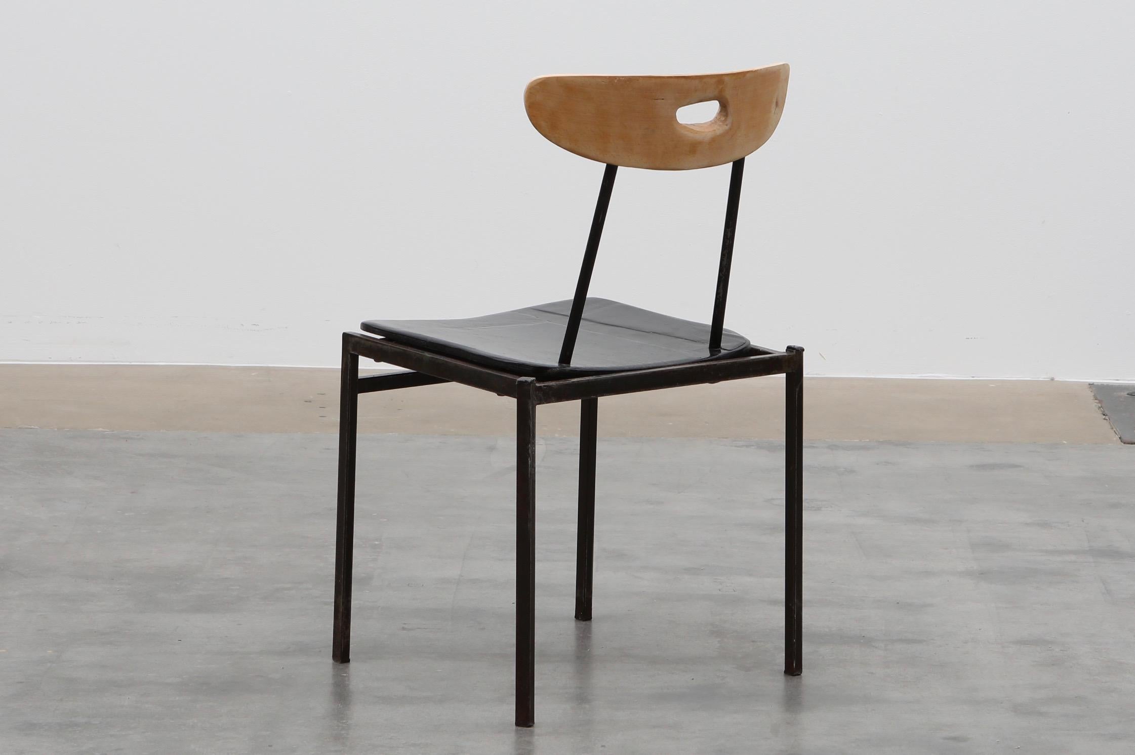 Solid side chair created 2019 by Atelier Staab. Combination of two midcentury pieces. Steel frame base with wooden seat/steel and wood backrest. Reshaped, cut, painted black and multi lacquered in high gloss 2k varnish. Martino Gampers work 100