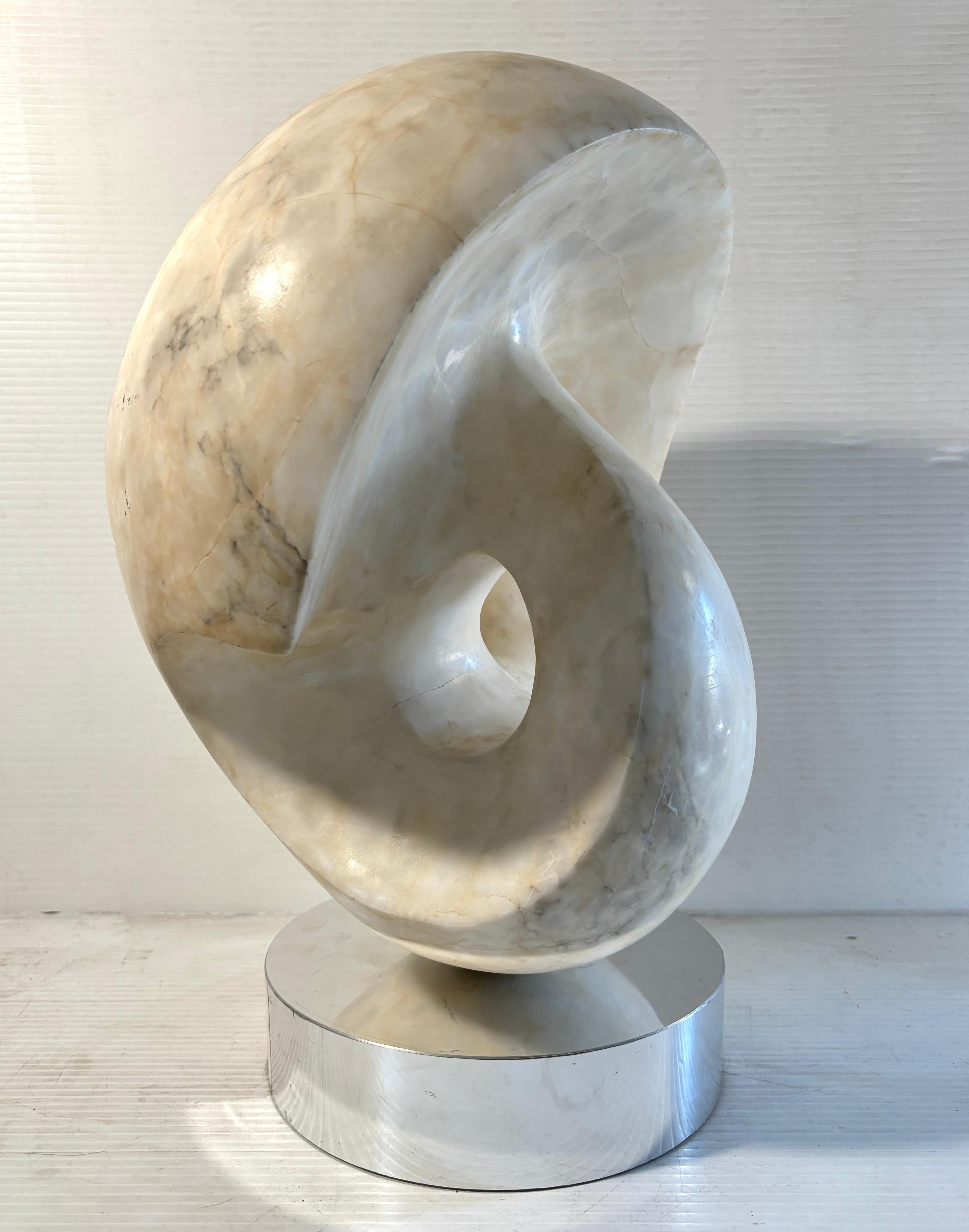 Beautiful artist made sculpture with heavy marble on a chrome rotating base. This piece has no front, so looks amazing from all angles. 
Please confirm location NY or NJ