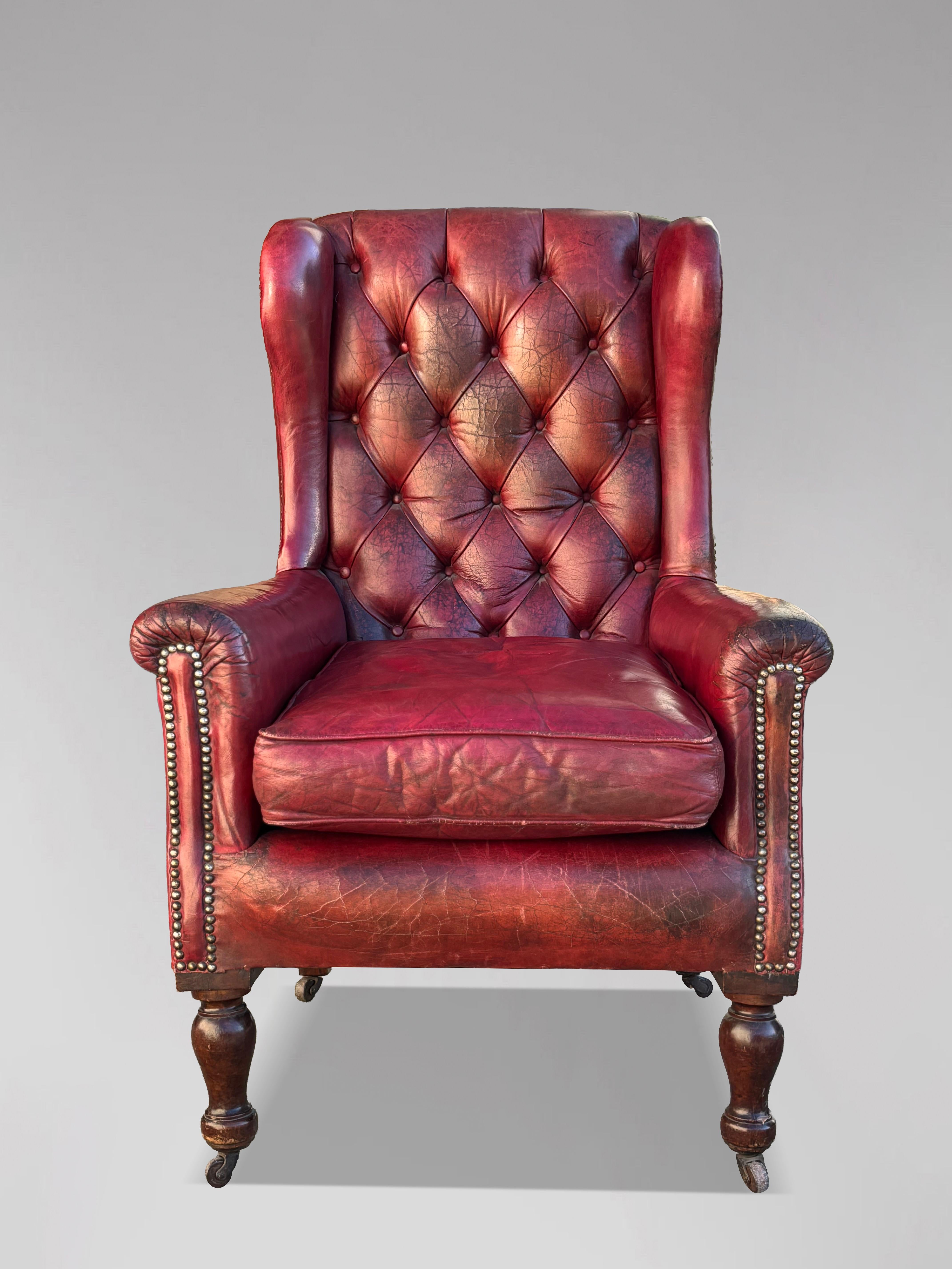 Sillón victoriano intacto de cuero rojo del siglo XIX con alas Victoriano en venta
