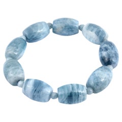 Untreated Blue Aquamarine Stone 270.77 cts with Expandable Silk Thread Bracelet