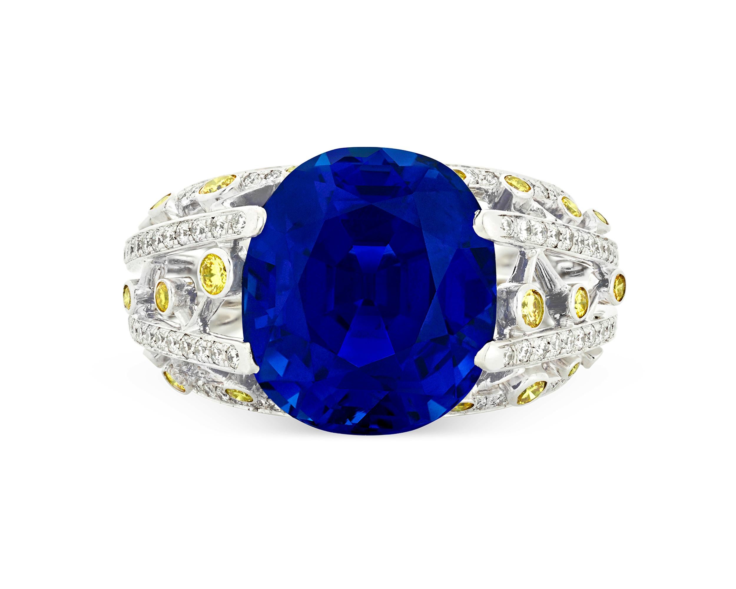 The rare beauty of a vividly hued, untreated Ceylon sapphire takes center stage in this bold and breathtaking ring crafted in Paris by internationally renowned jeweler Fred. Boasting an impressive 15.24 carats, this antique cushion-cut royal blue