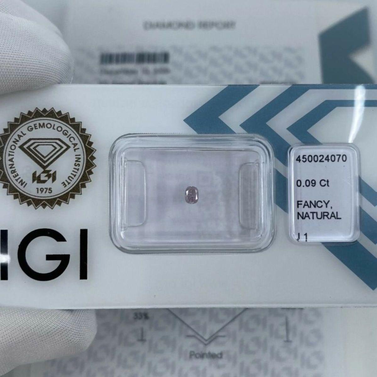 Untreated Fancy Pink Diamond IGI Certified 0.09ct Sealed Blister I1 Cushion Cut

Certified Fancy Pink Diamond Sealed In IGI Seal.
Natural untreated pink diamond with a rare fancy light pink colour. 0.09 carat. With I1 clarity.
Fully certified by IGI