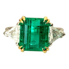 Untreated Green Emerald 5.00 Carat GIA Certified with Platinum and Diamond Ring