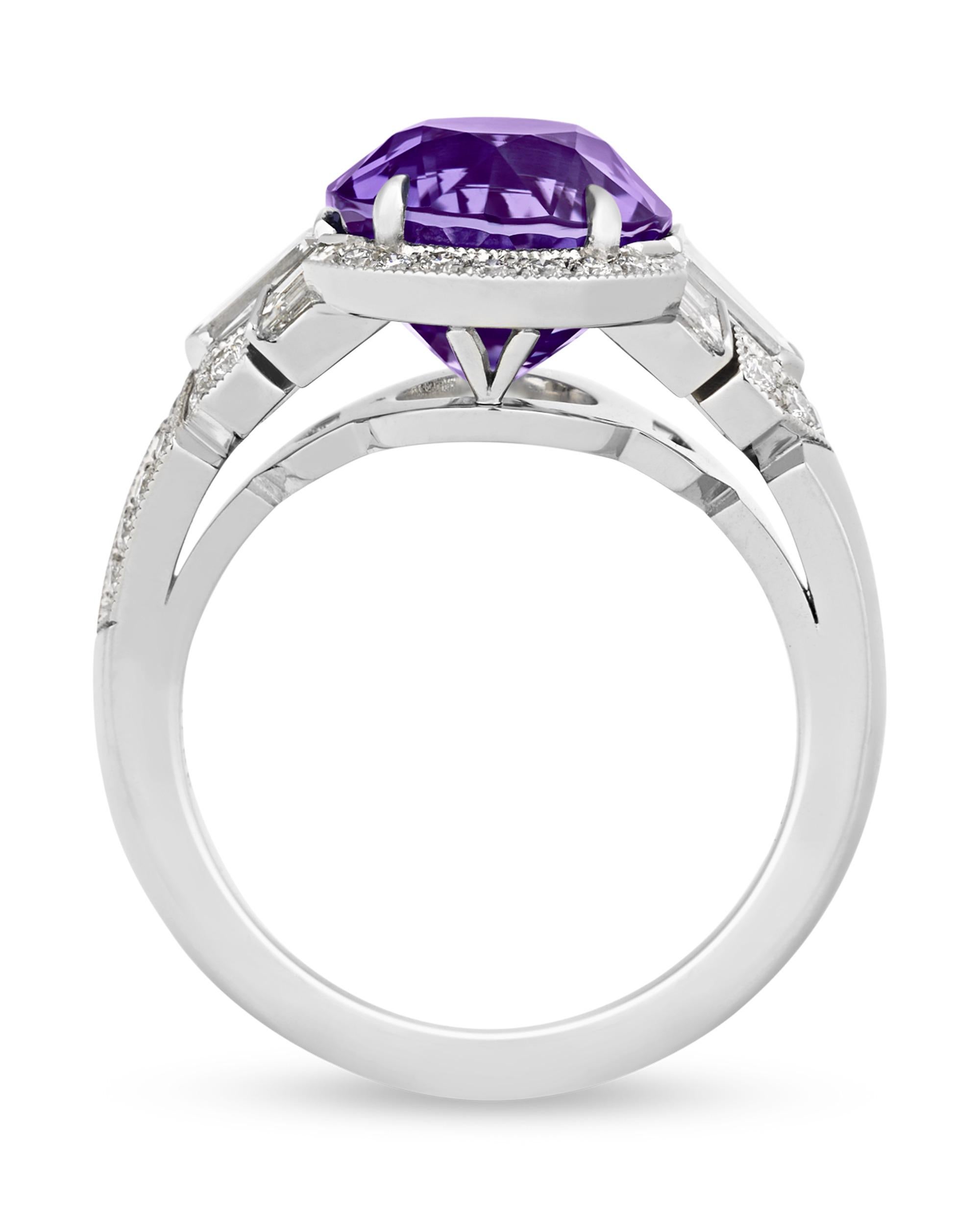 A brilliant-cut sapphire displays an elegant and desirable lilac hue in this creation from the famed American jewelry firm Raymond Yard. The 5.10-carat sapphire is certified by the Gemological Institute of America as originating in Ceylon, with no