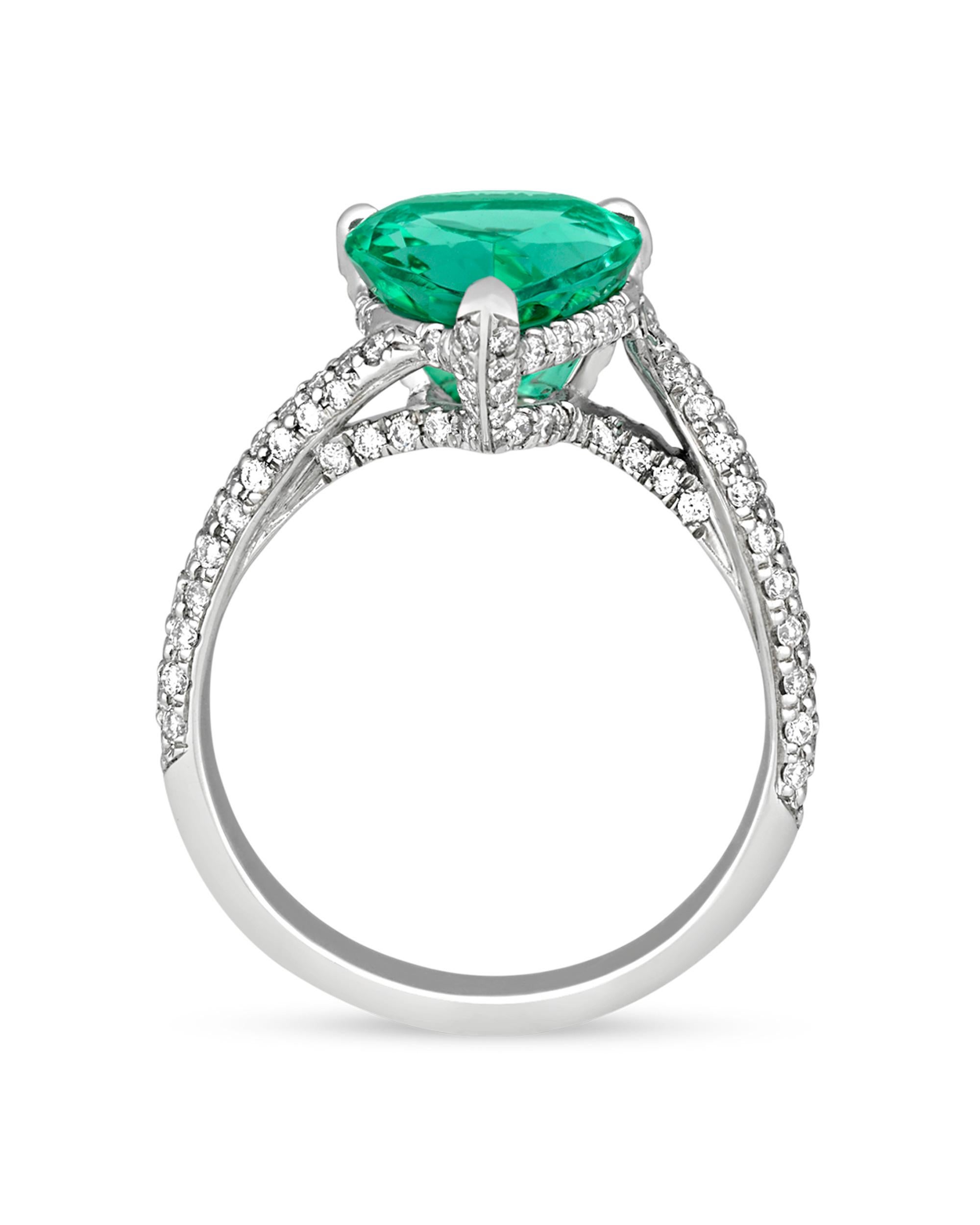 An electric green 3.35-carat pear-shaped Paraiba tourmaline stars in this ring. First discovered in 1989, the Paraiba tourmaline is one of the world’s rarest and most vibrant gemstones. These extraordinary stones have only been found in the