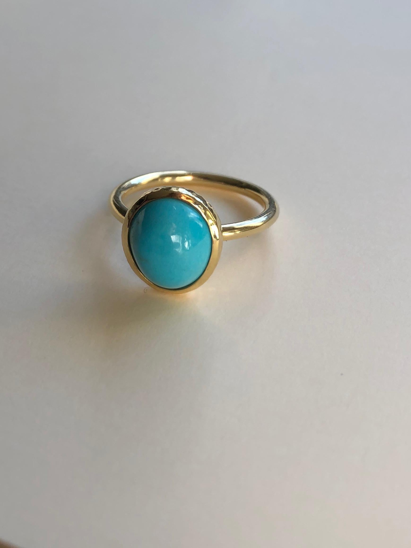 It is exquisitely rare to find 100% untreated turquoise of this color and quality. From the Morenci mine in Arizona, and cut by hand from a master lapidary in Hawaii, this turquoise is unparalleled. The bezel setting is hand fabricated in 18 karat