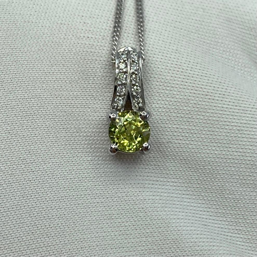 Vivid Yellow Untreated Sapphire & Diamond 18k White Gold Pendant Necklace.

0.80 Total carat untreated Australian sapphire with a beautiful vivid yellow colour and excellent clarity, very clean stone. Also has an excellent round brilliant cut