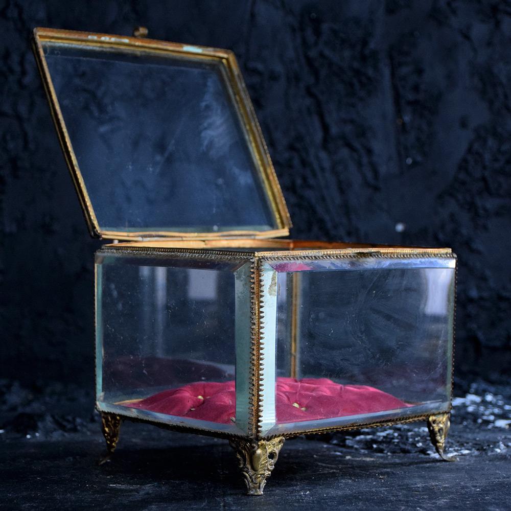 Unusally large 19th Century French jewellery casket 
A lovely yet unusally large French late 19th Century hand crafted brass and cut glass jewellery casket box. With its orignal sink cusion base still in place if not abit worn. 
Size in inches