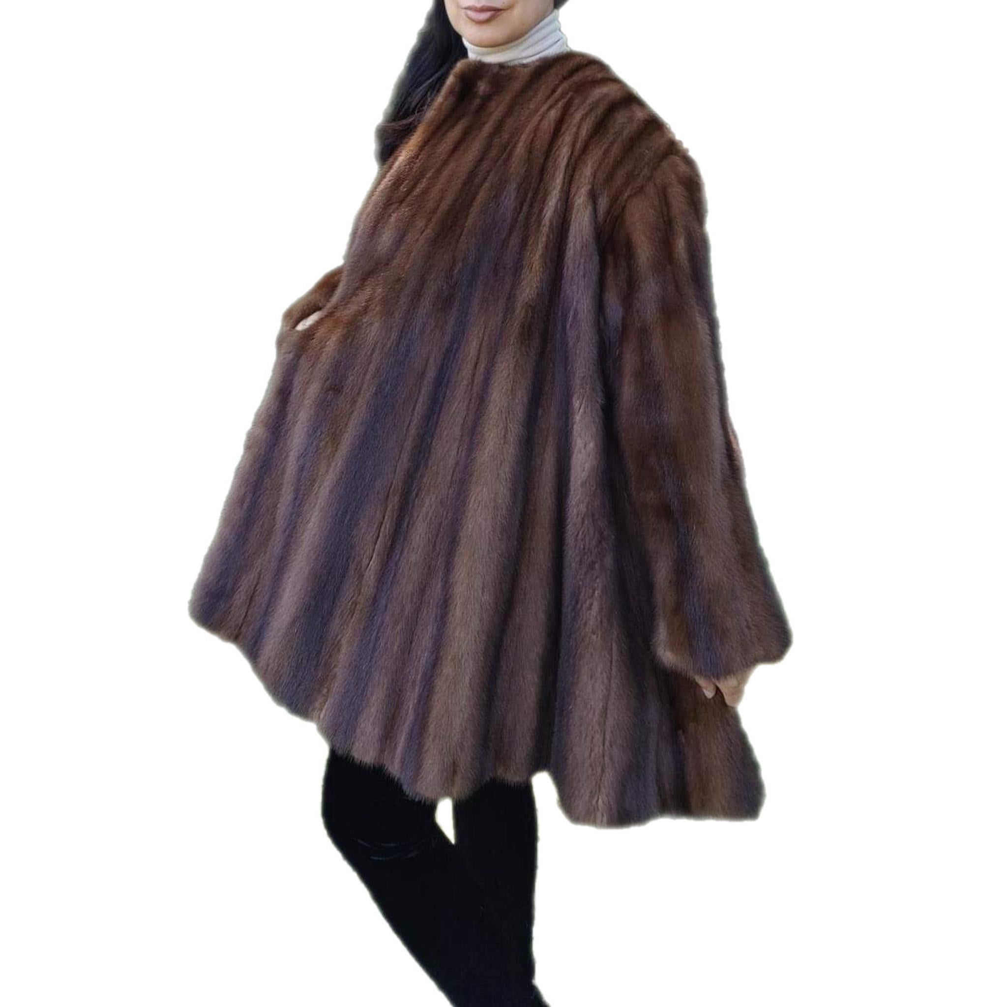 PRODUCT DESCRIPTION:

Unused Birger Christensen Demi Buff Swing wide Extra wide Sweep Mink Fur Coat (Size-24/2XL)

Renowned Birger Christensen  label, very wide sweep skirt, impeccable supple fur, vibrant Colors, 100% silk lining.

Condition: