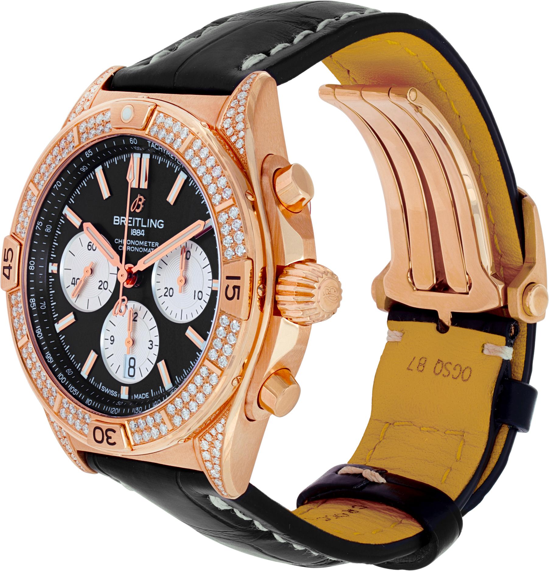 Breitling Chronomat B01 in 18k rose gold with original double row diamond bezel and lugs on a black alligator strap with white stitching. 18k rose gold deployant buckle. Auto movement under glass w/ subseconds, date and chronograph. 42 mm case size.