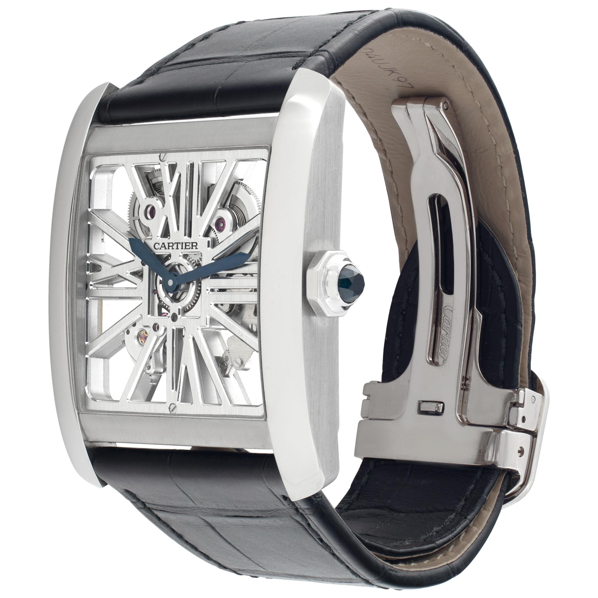 New old stock. Cartier Tank MC Skeleton Large Palladium watch on leather strap with Cartier 18k white gold deployant buckle. A rare platinum class metal 2 times more expensive then platinum. 20 jewels. Manual. 34 mm case size. Unused with box, tag