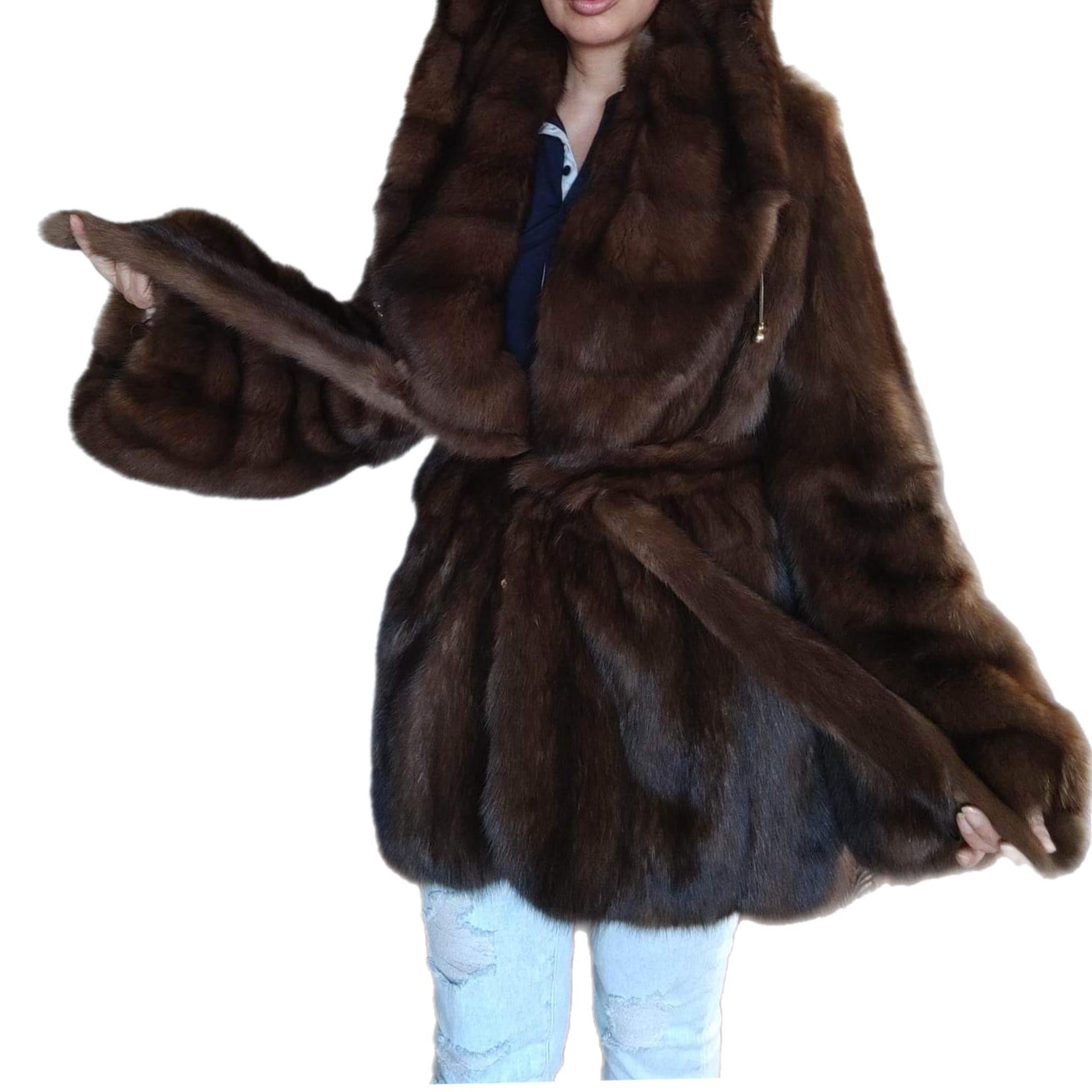 PRODUCT DESCRIPTION: 
Brand new Christian Dior sobol Russian Sable fur coat size 12-14
This beautiful rare find is made of full skins fluffy Russian sable fur, always kept in frozen vault, pristine condition never worn with tags the lining is brand