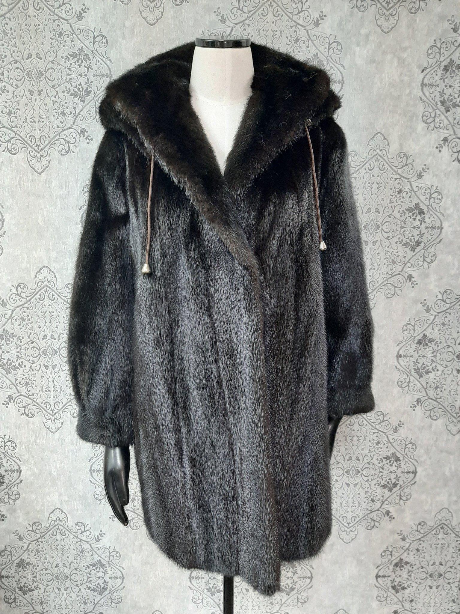 PRODUCT DESCRIPTION:

Brand new luxurious Mink fur coat with a hood

Condition: Brand New

Closure: Buttons

Color: Brown

Material: Mink

Garment type: Coat

Sleeves: Princess cuffs

Pockets: two pockets

Collar: Short collar

Lining: Shirred Silk