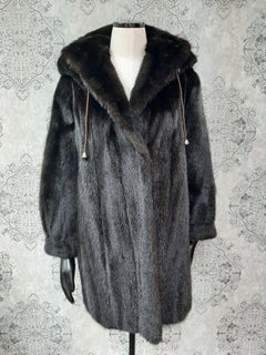 Unused mink fur coat with a hood size 10-12