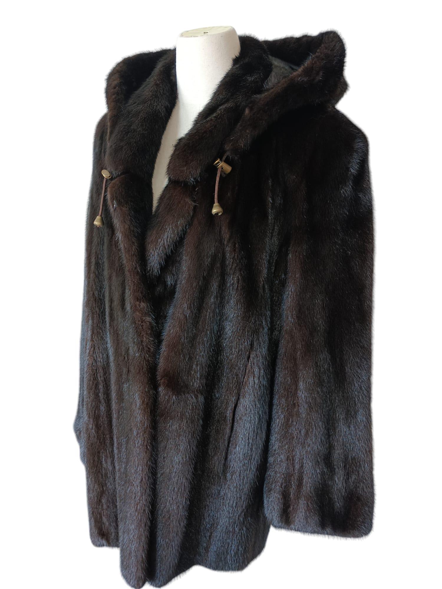 PRODUCT DESCRIPTION:

Brand new luxurious Mink fur coat with a hood

Condition: Brand New

Closure: Buttons

Color: Brown

Material: Mink

Garment type: Coat

Sleeves: Princess cuffs

Pockets: two pockets

Collar: Short collar

Lining: Shirred Silk