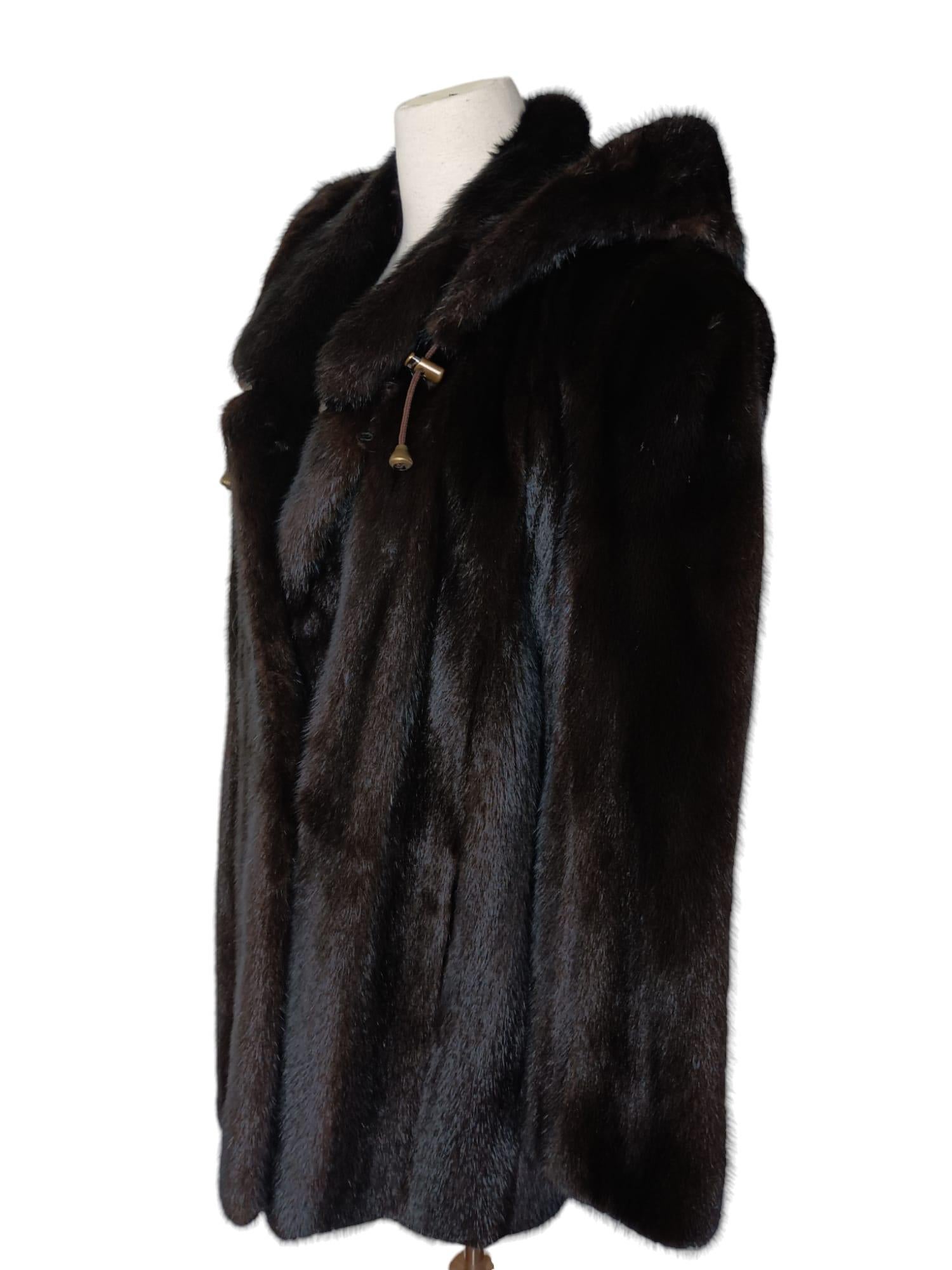 ***** mink fur coat with a hood size 12 4
