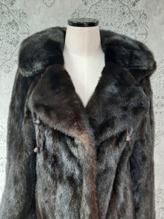 Unused mink fur coat with a hood size 14