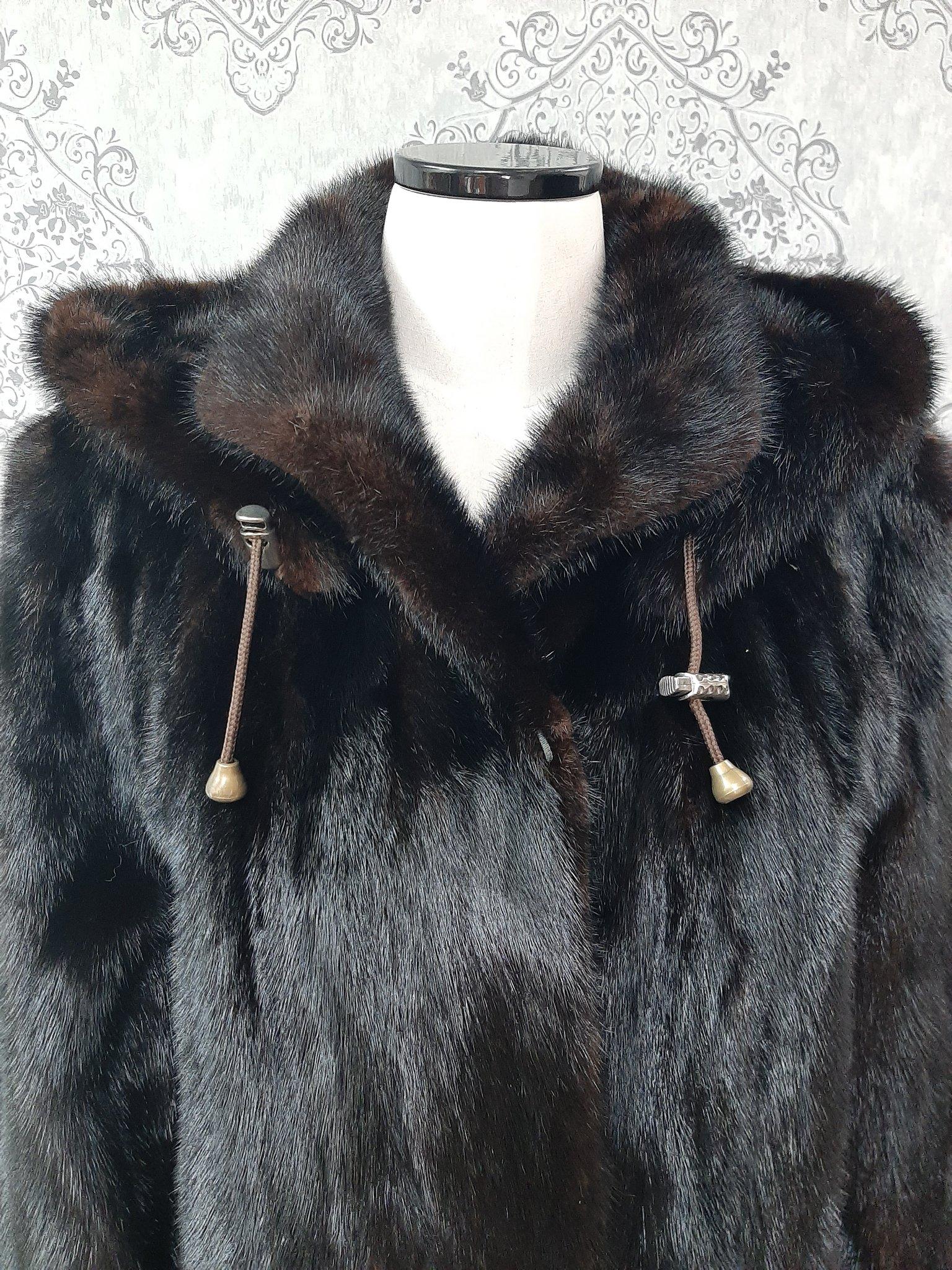 PRODUCT DESCRIPTION:

Brand new luxurious Mink fur coat with a hood

Condition: Brand New

Closure: Buttons

Color: Brown

Material: Mink

Garment type: Coat

Sleeves: Princess cuffs

Pockets: two pockets

Collar: Short collar

Lining: Shirred Silk