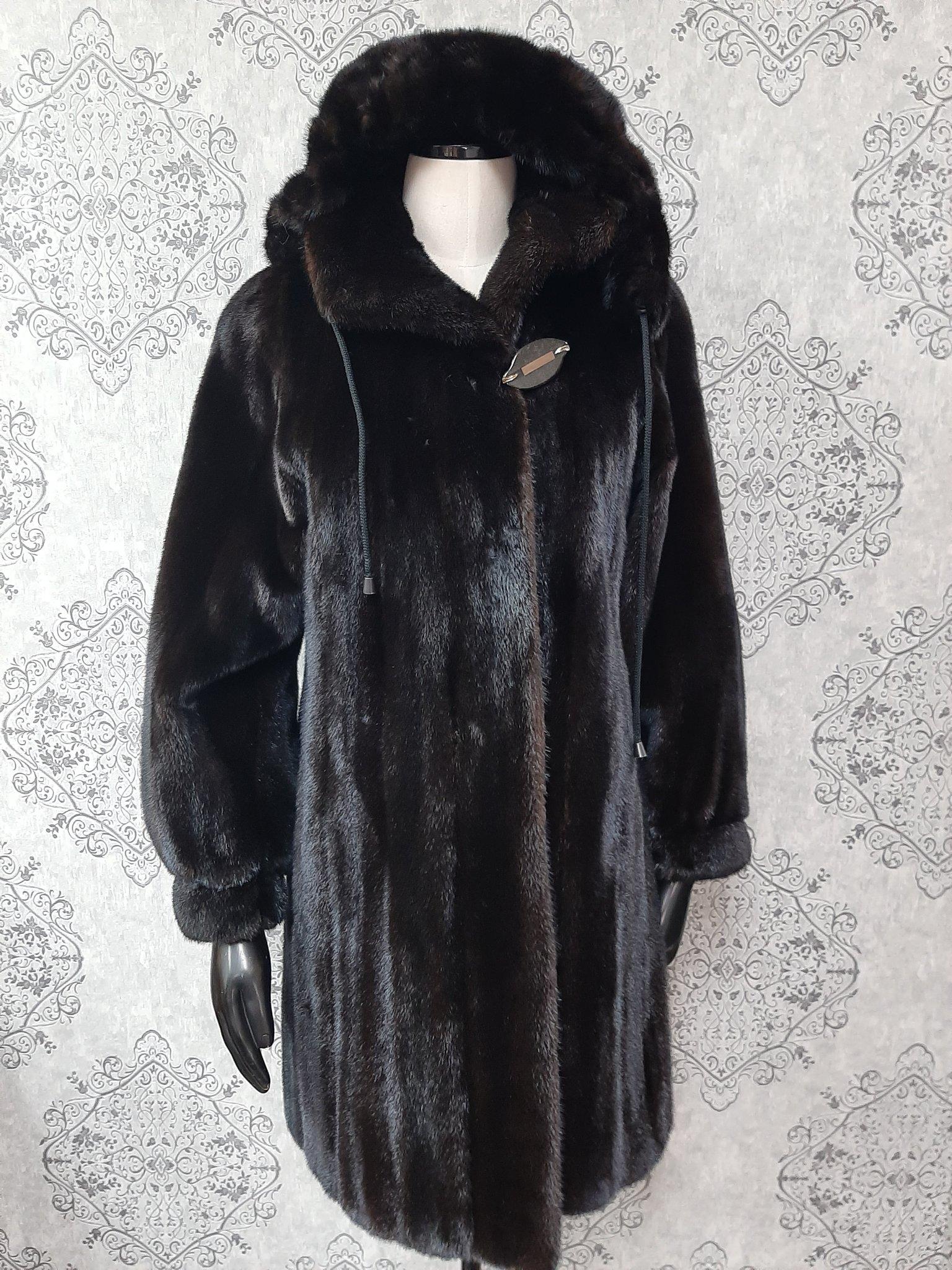 PRODUCT DESCRIPTION:

Brand new luxurious Mink fur coat with a hood

Condition: Brand New

Closure: Buttons

Color: Brown

Material: Mink

Garment type: Coat

Sleeves: Princess cuffs

Pockets: two pockets

Collar: Short collar

Lining: Shirred Silk