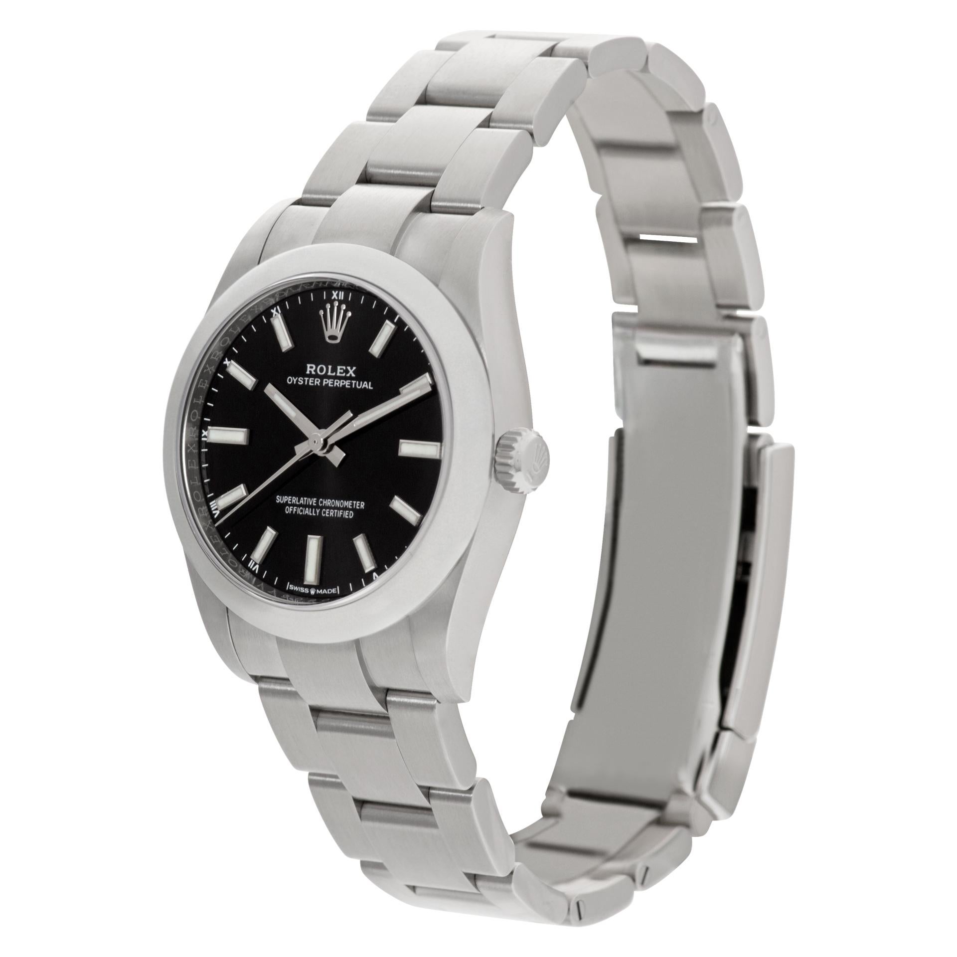 Rolex Oyster Perpetual in stainless steel. Auto w/ sweep seconds. 34 mm case size. Unused with papers. Circa 2021. Ref 124200. **Bank wire only at this price** Fine Unused Rolex Watch.

 Unused Sport Rolex Oyster Perpetual 124200 watch is made out