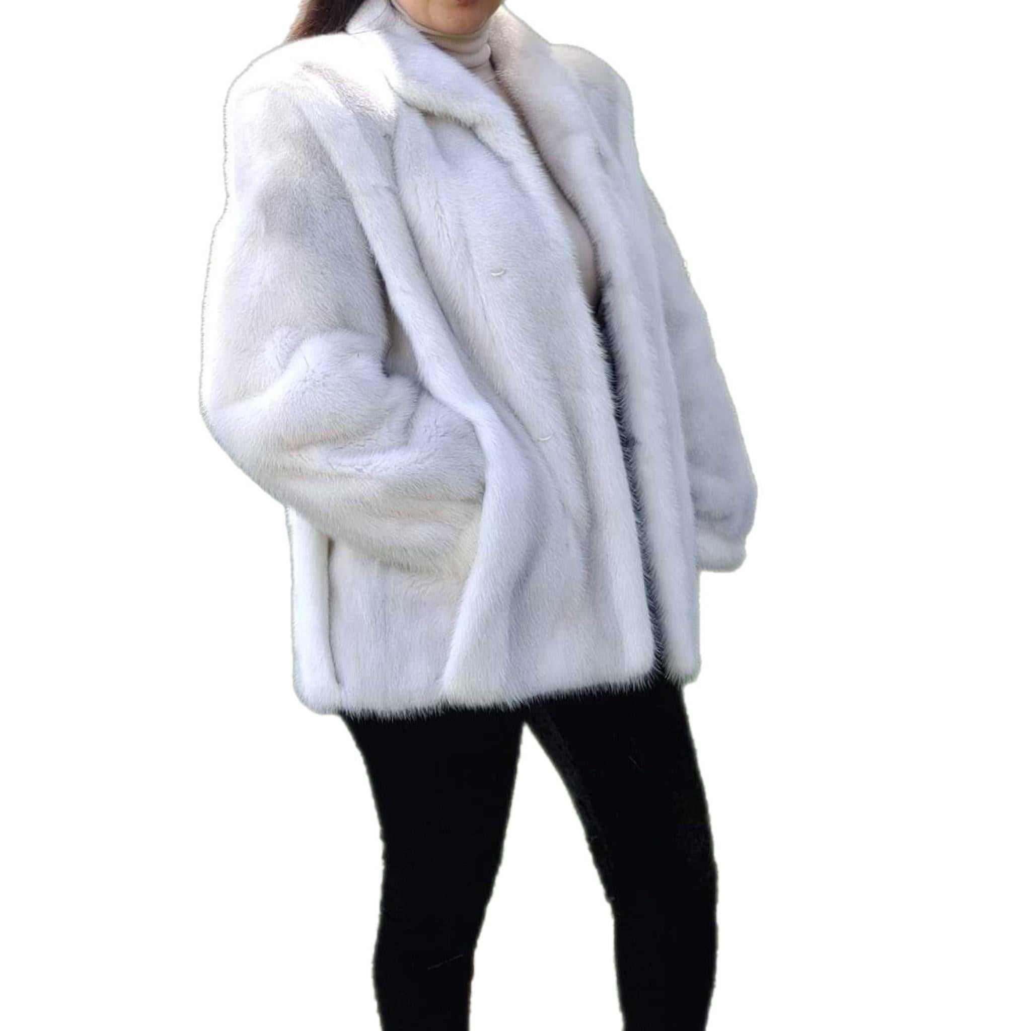 ~ Unused Tourmaline Mink Fur Coat (Size 8 - M) 

Made in Canada

MEASUREMENTS :
Size: 8 (M)

-LENGTH: 32''

-BACK ACROSS: 22''

-SLEEVES neck to shoulder and Shoulder to wrist:29-24''

-INSIDE ARMHOLE TO ARMHOLE: 22''

-BUST: 44

-SWEEP: 57''

