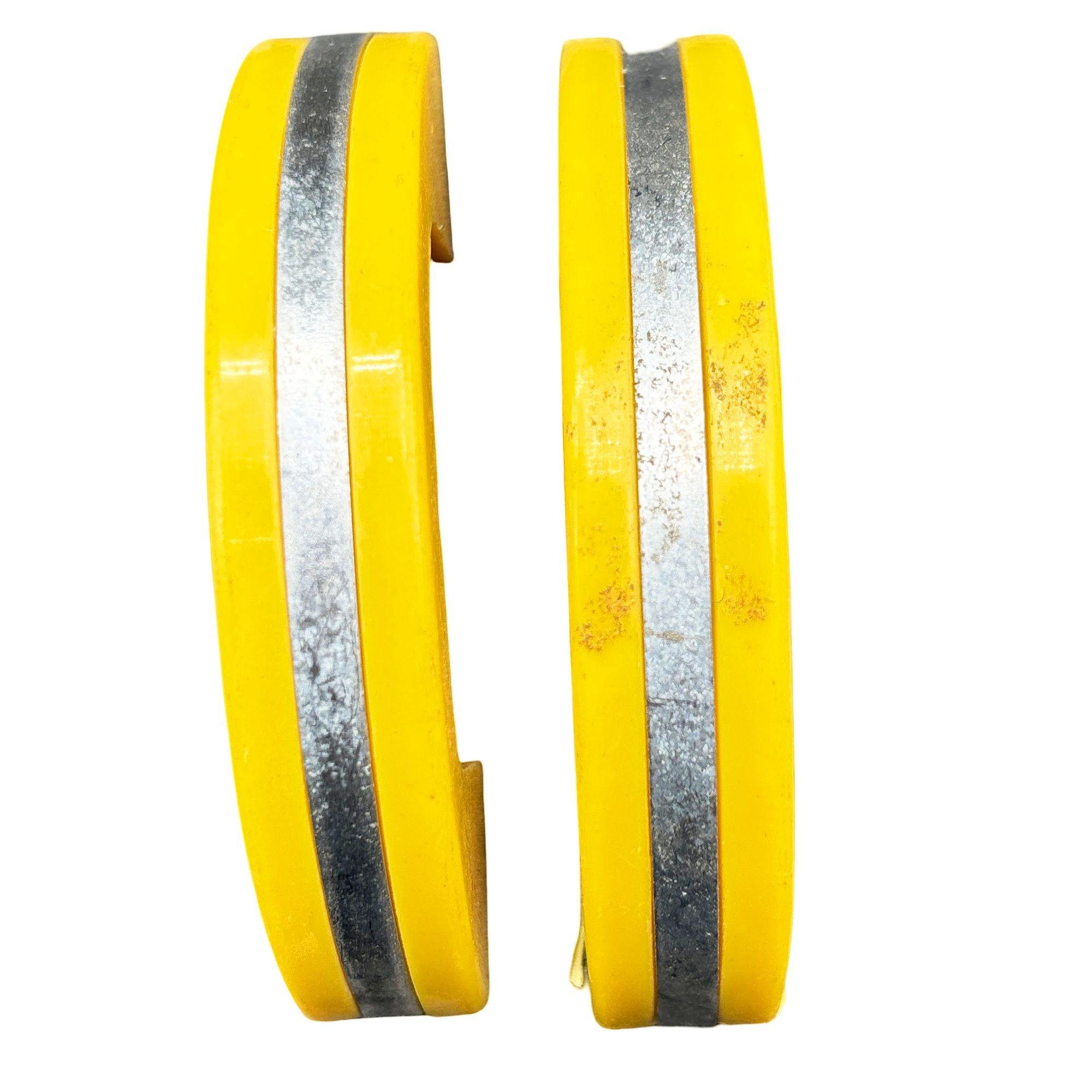 Unused yellow Art Deco bakelite door/drawer Pulls with center chrome strip, Set of 19. If you are redoing your kitchen in a 30s or 40s motif or simply looking for a vintage handle/pull for your woodworking project, these pieces are an excellent