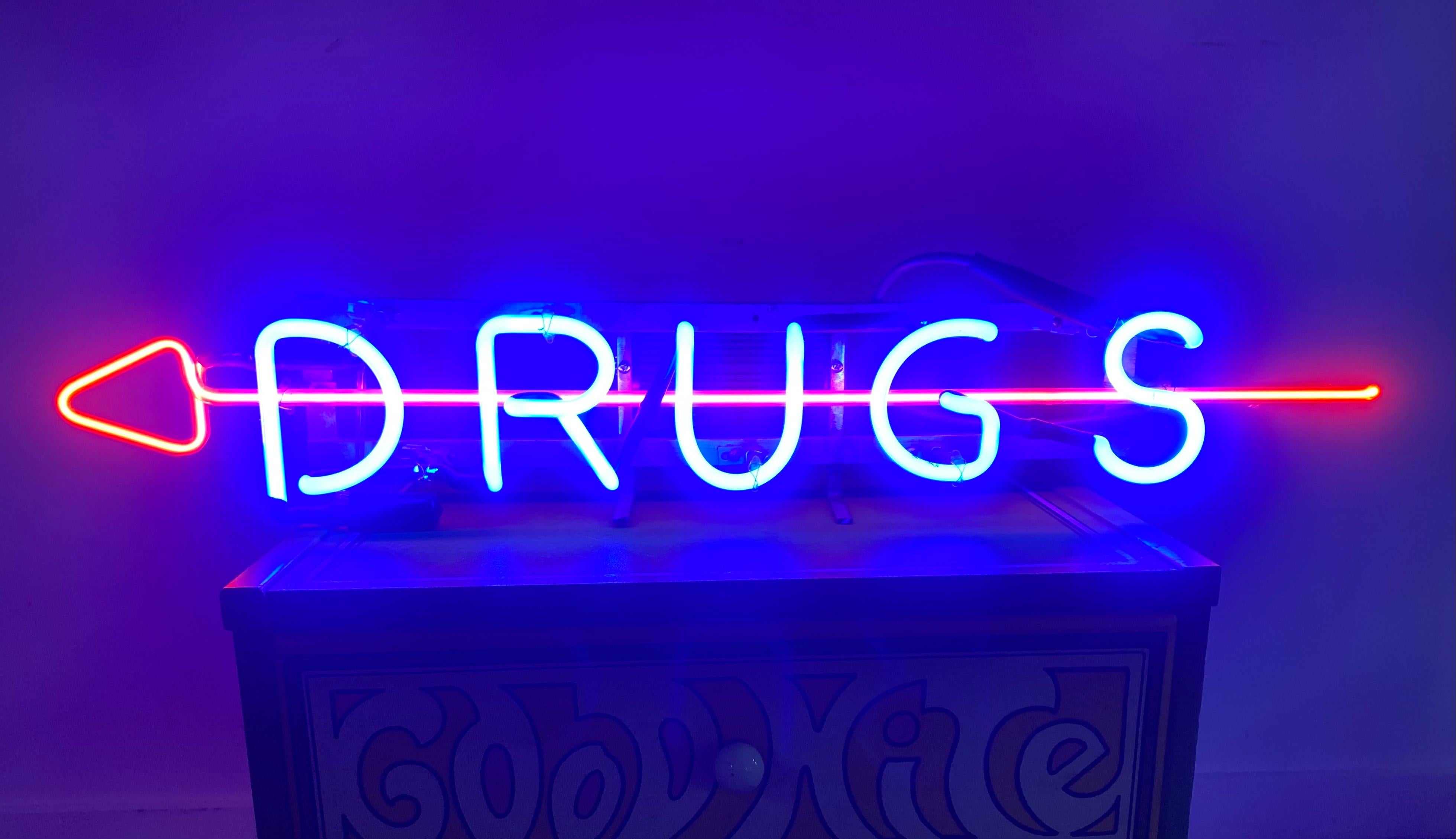 drugs neon sign