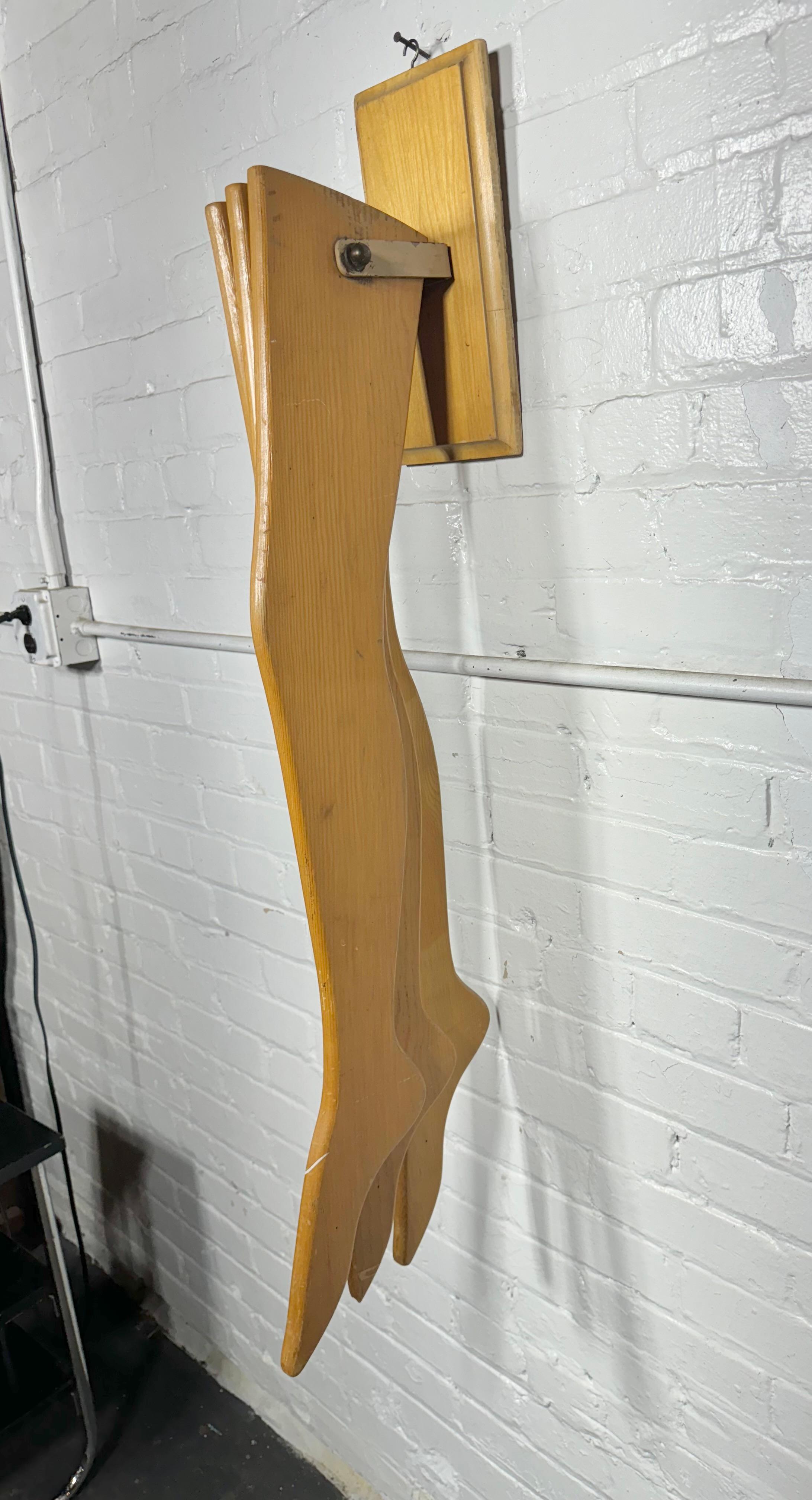 Unusual 1950s Modernist Store Display, HOSIERY, articulating wood legs In Good Condition For Sale In Buffalo, NY