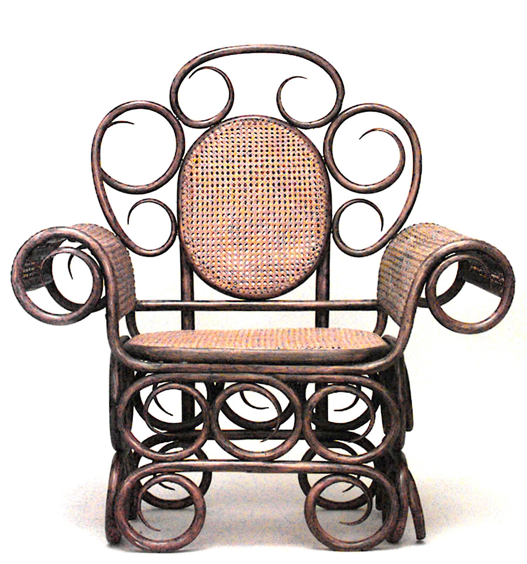 Austrian Bentwood (19th Cent) unusual scroll design roll arm chair with cane panels.
