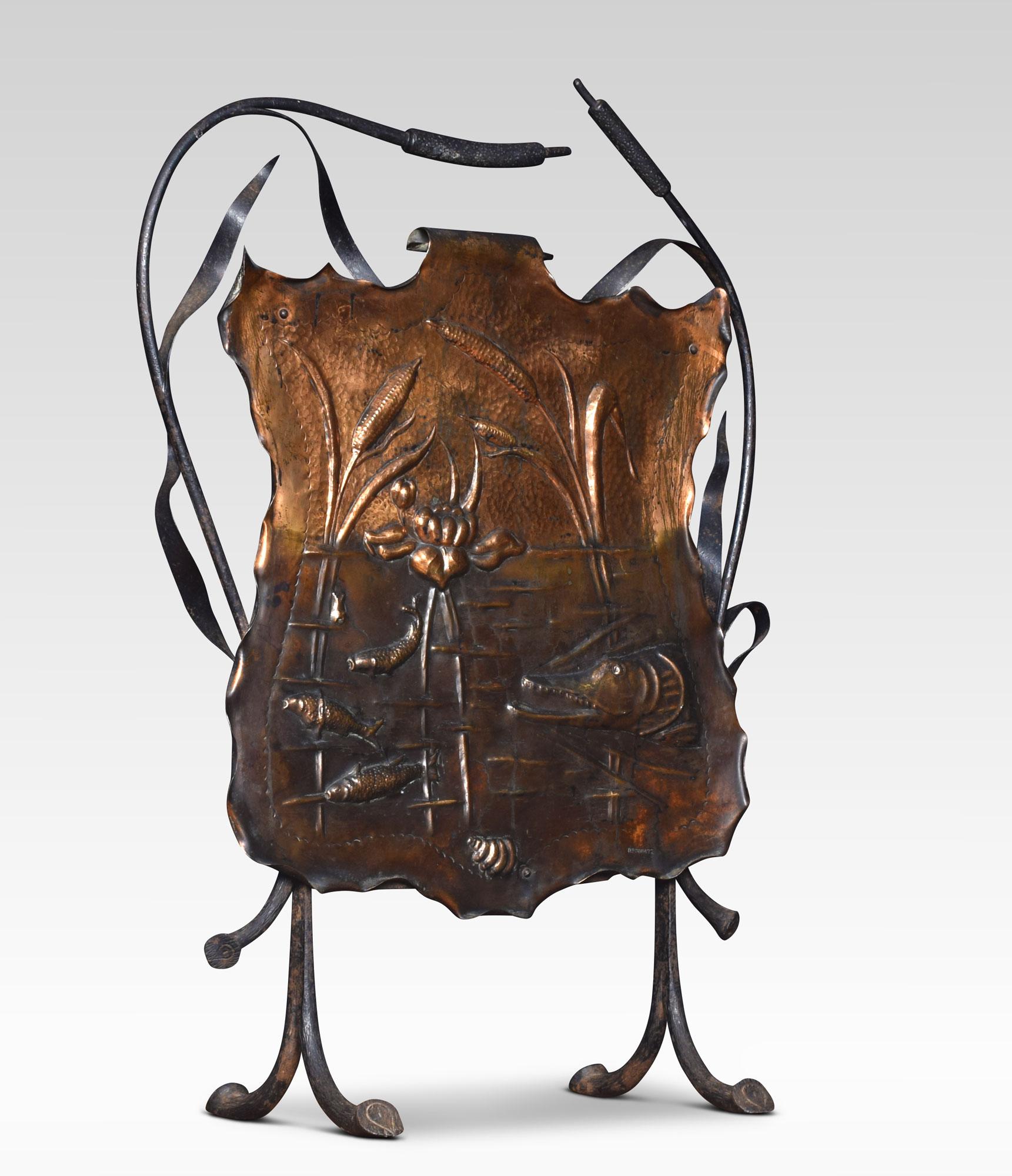 Unusual 19th century copper fire screen depicting a pike in a lake with foliated decoration supported on twin supports and stylized bullrushes.
Dimensions:
Height 32 inches
Length 22.5 inches
Width 10 inches.