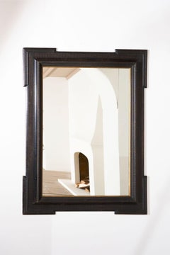 Unusual 19th Century Ebonised Italian wall mirror