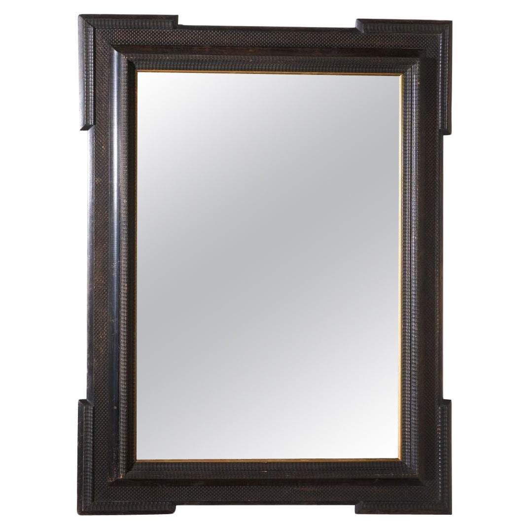 Unusual 19th Century Ebonised Italian wall mirror