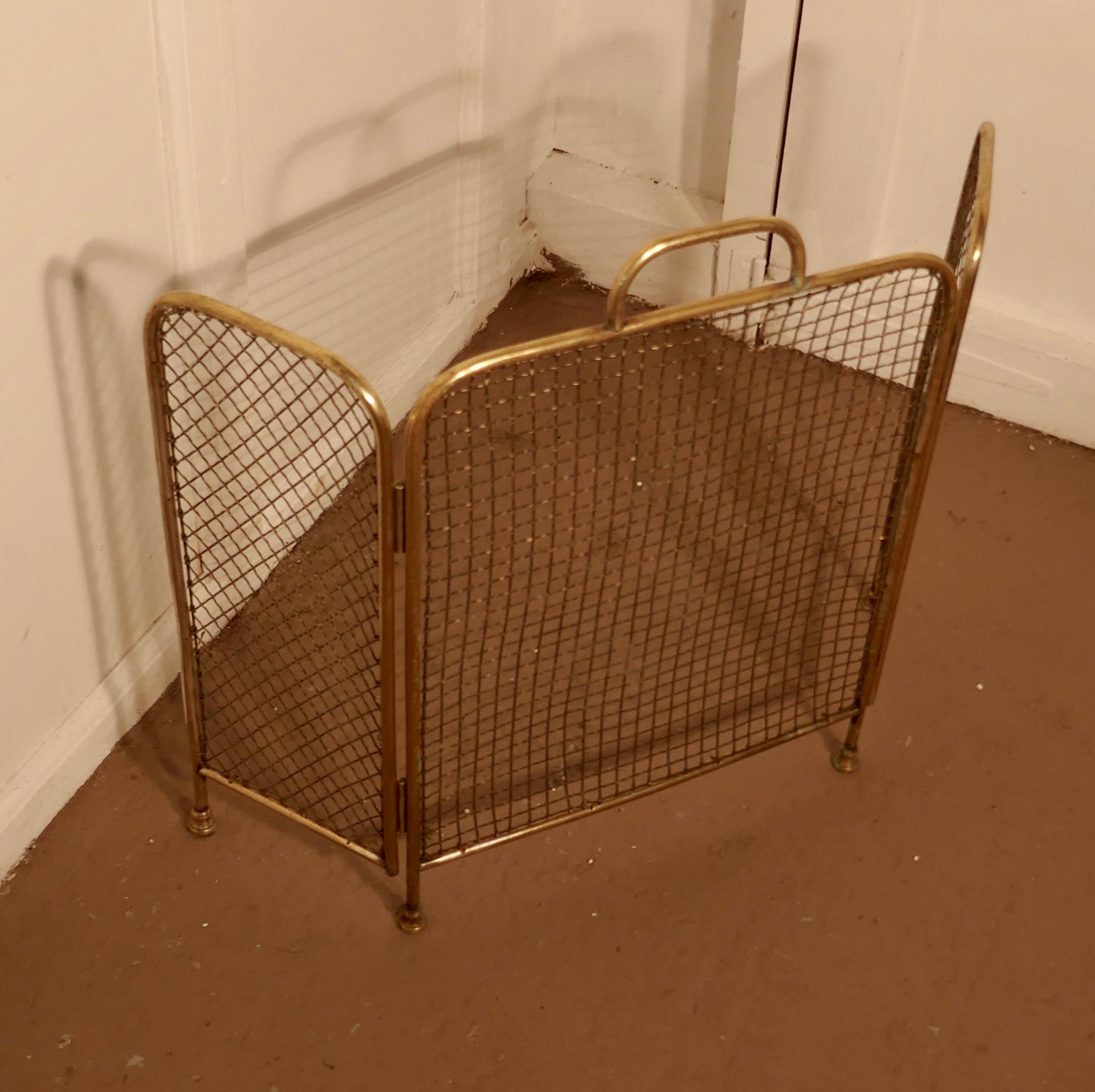 Unusual 19th century folding brass fire guard 

This is an unusual Fireguard, the guard is all made in Brass, both the frame and the mesh are brass, it has the added advantage that it folds flat for storage, and when opened out it cab have shaped