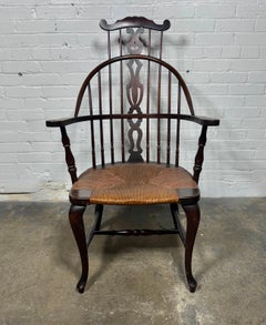 Unusual 19th Century Windsor Arm Chair With Rush Seat..