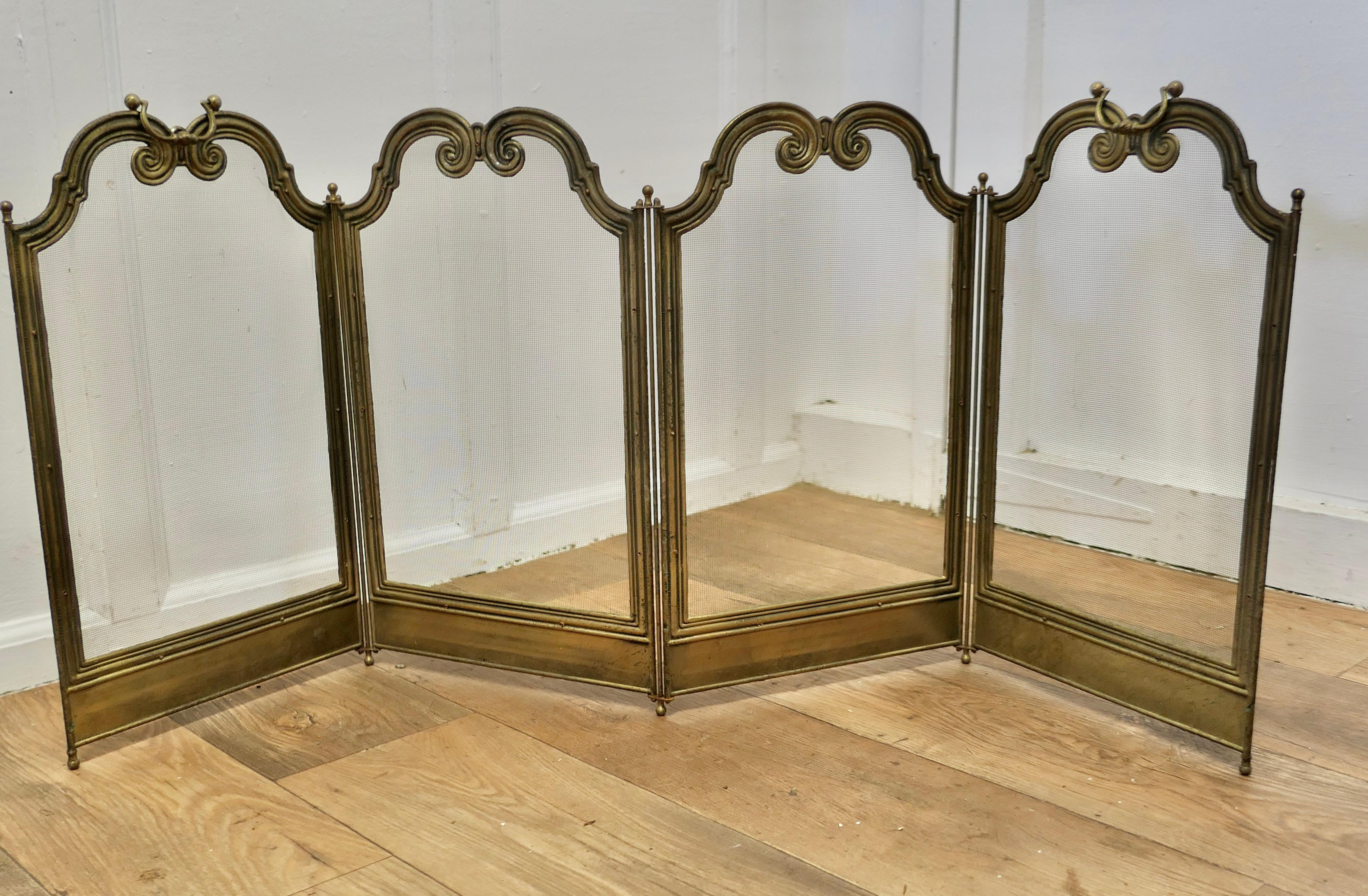 Unusual 4 Fold French Brass Fire Guard 

This is a heavy folding Fireguard, the guard is all made in Brass, both the frame and the mesh are brass, it has the added advantage that it folds flat for storage, and when opened out it can be shaped to
