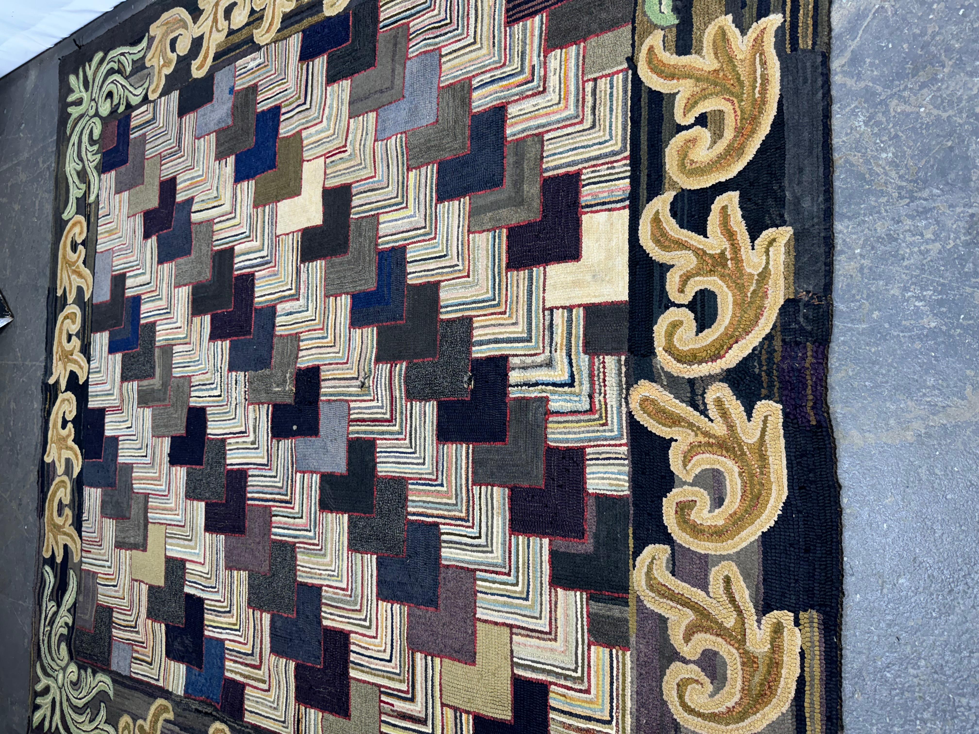  American Antique Geometric Hook Rug, c.1930s,, Wonderful use of color, patterns, Very unusual with its traditional floral and abstract geometrics. Nice original condition. Age appropriate wear.

American hooked rug, crafted through the traditional